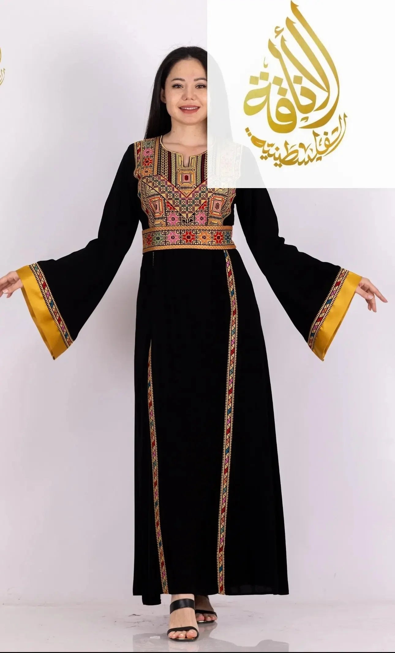 Fadwa Embroidered Thoub by Palestinian Elegance black traditional dress with colorful geometric embroidery and wide sleeves