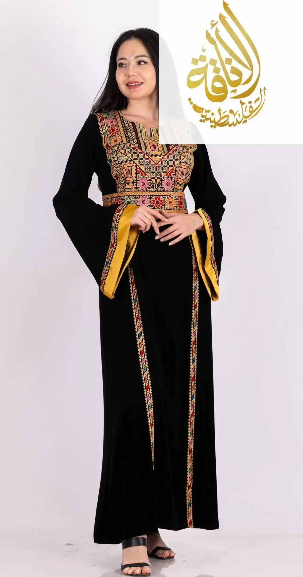 Palestinian Elegance Fadwa Embroidered Thoub black dress with colorful embroidery and yellow satin sleeve details