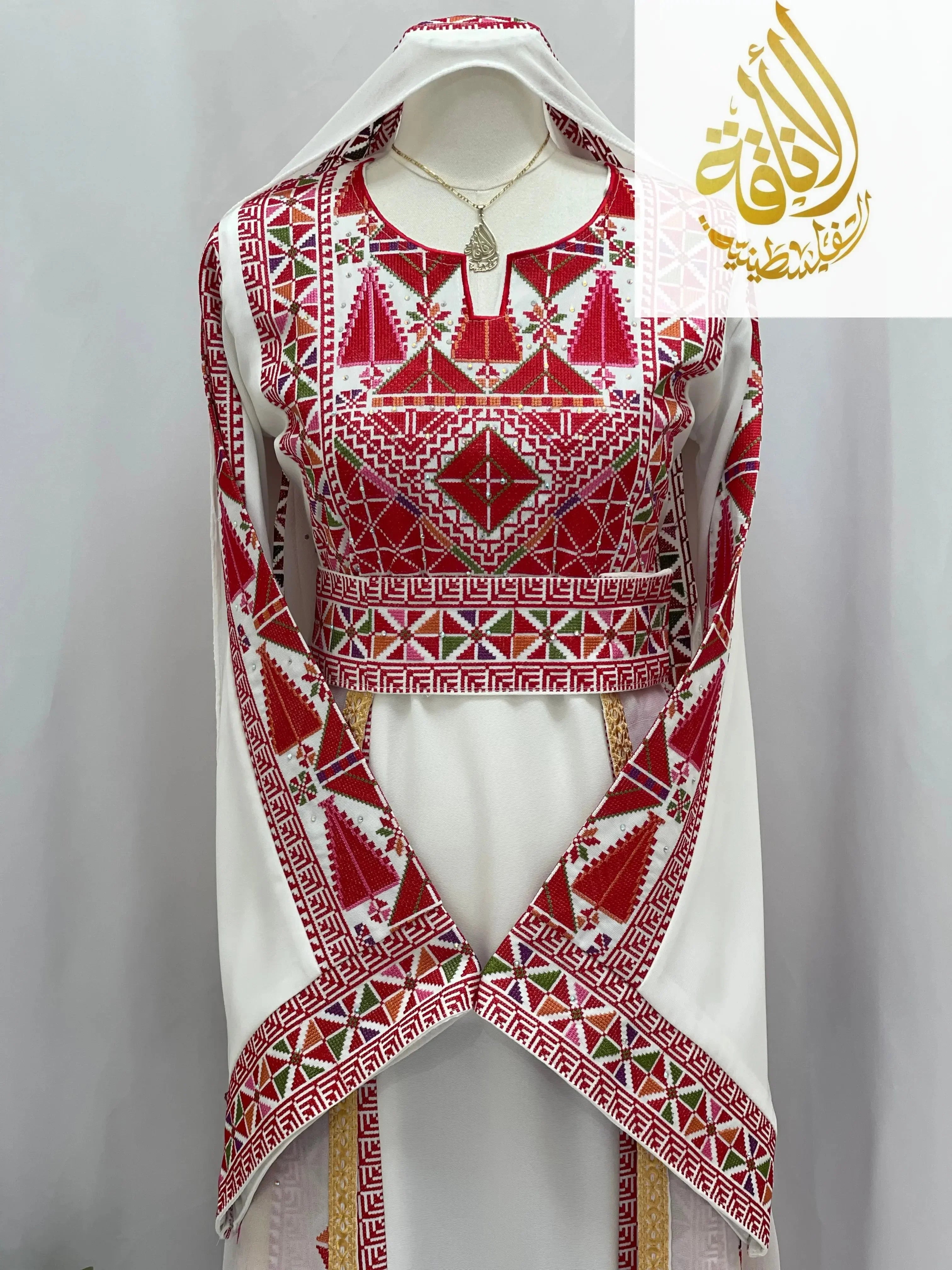 Palestinian Elegance Falahi thoub with overskirt embroidered in traditional red and white patterns