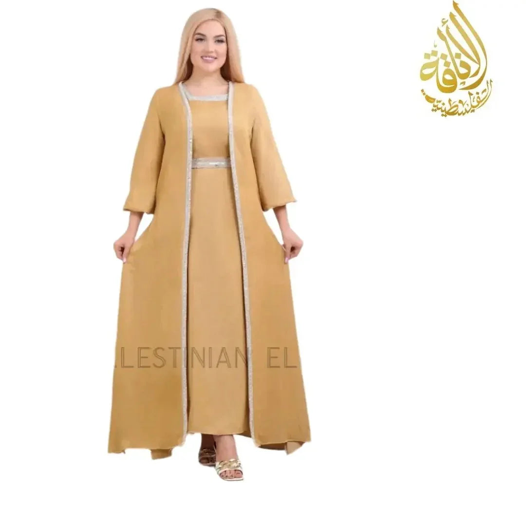 Palestinian Elegance fancy dress abaya online in beige with silver trim and long sleeves
