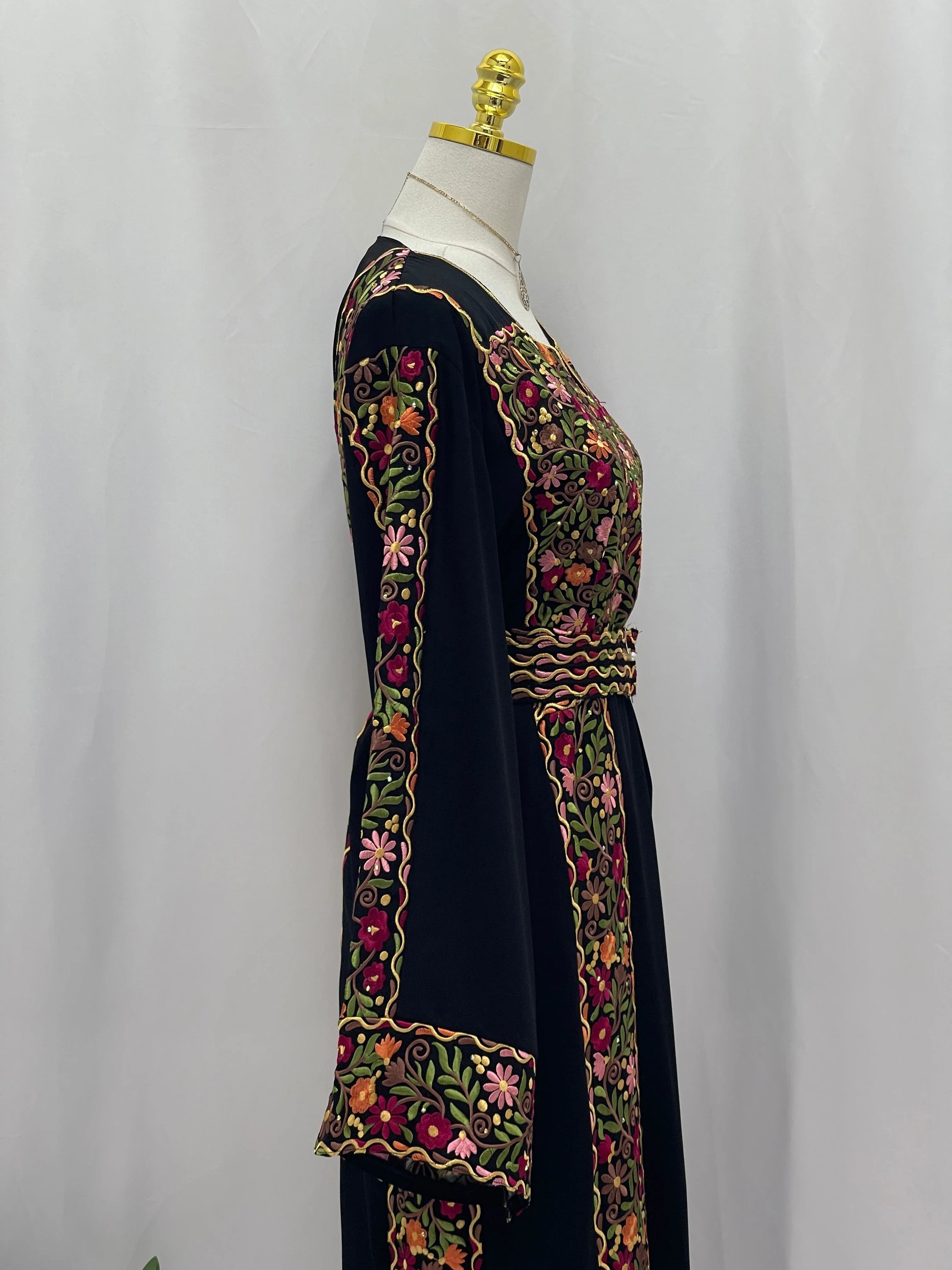 Floral Essence Embroidered Thobe featuring vibrant floral embroidery and elegant design