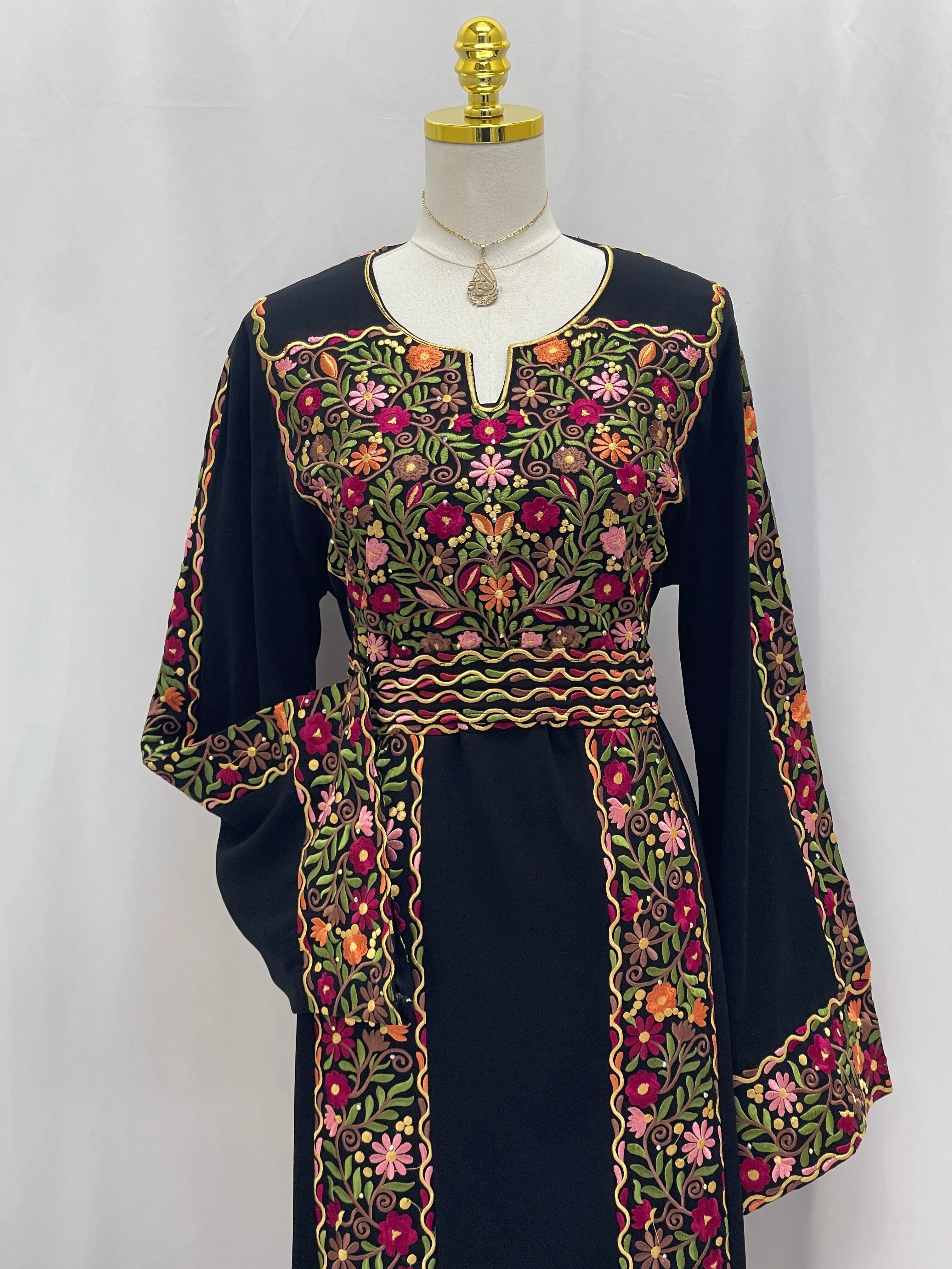 Floral Essence Embroidered Thobe with vibrant floral patterns and stylish design for elegant occasions