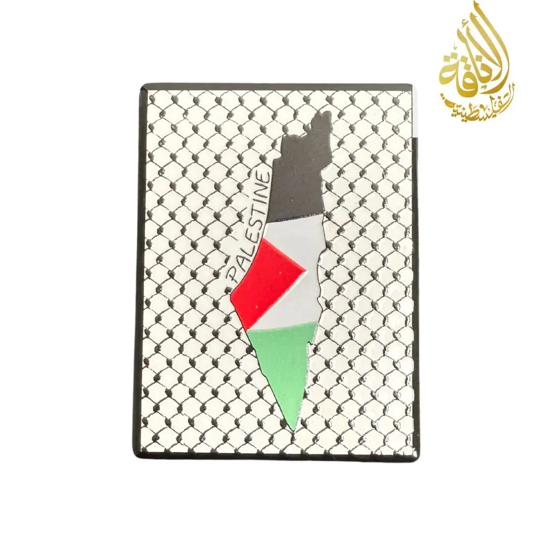 Palestinian fridge magnet with map shape and flag colors on black and white patterned background