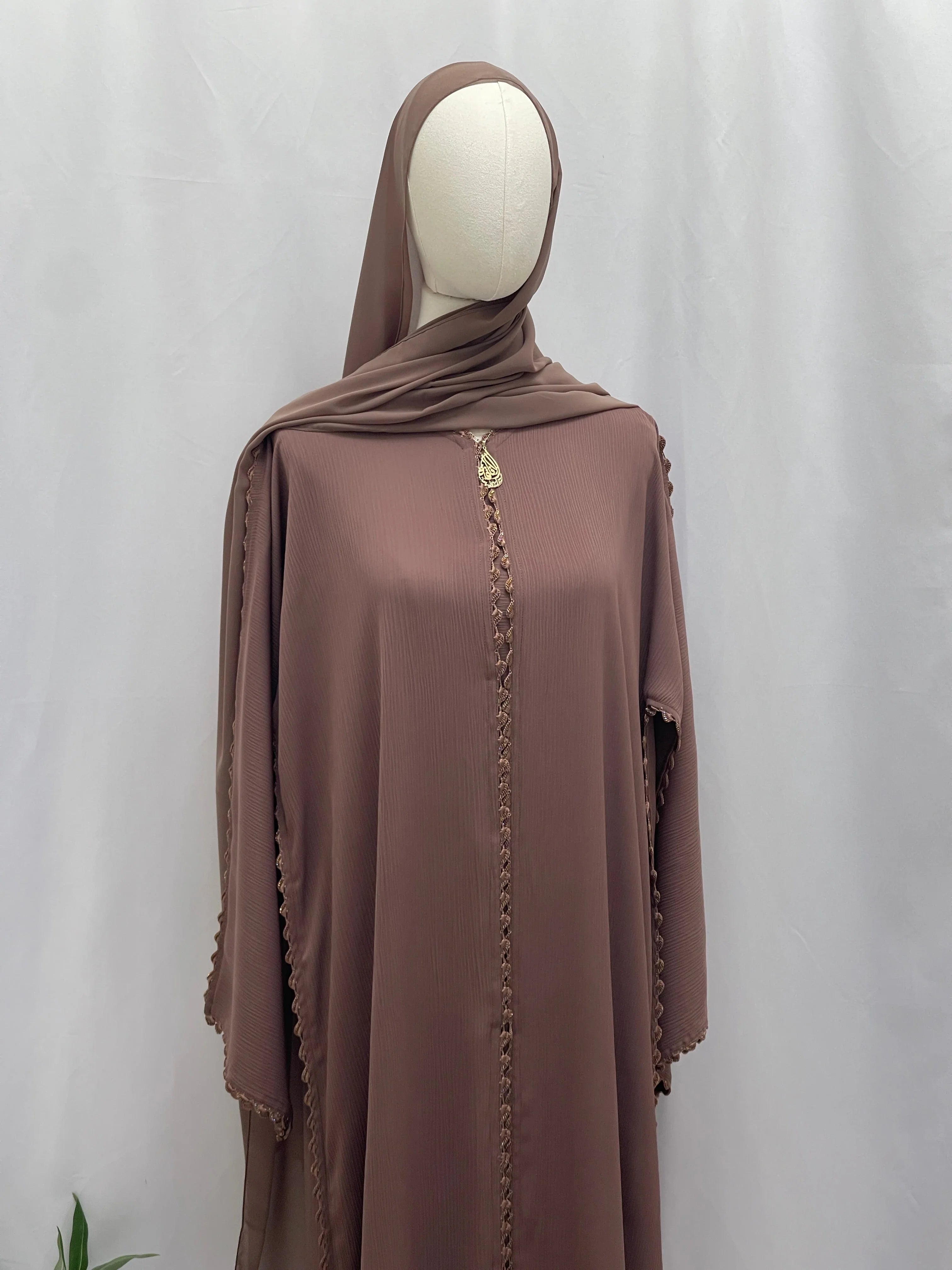Palestinian Elegance Ghosoon Abaya in soft brown with delicate embroidered trim and matching headscarf