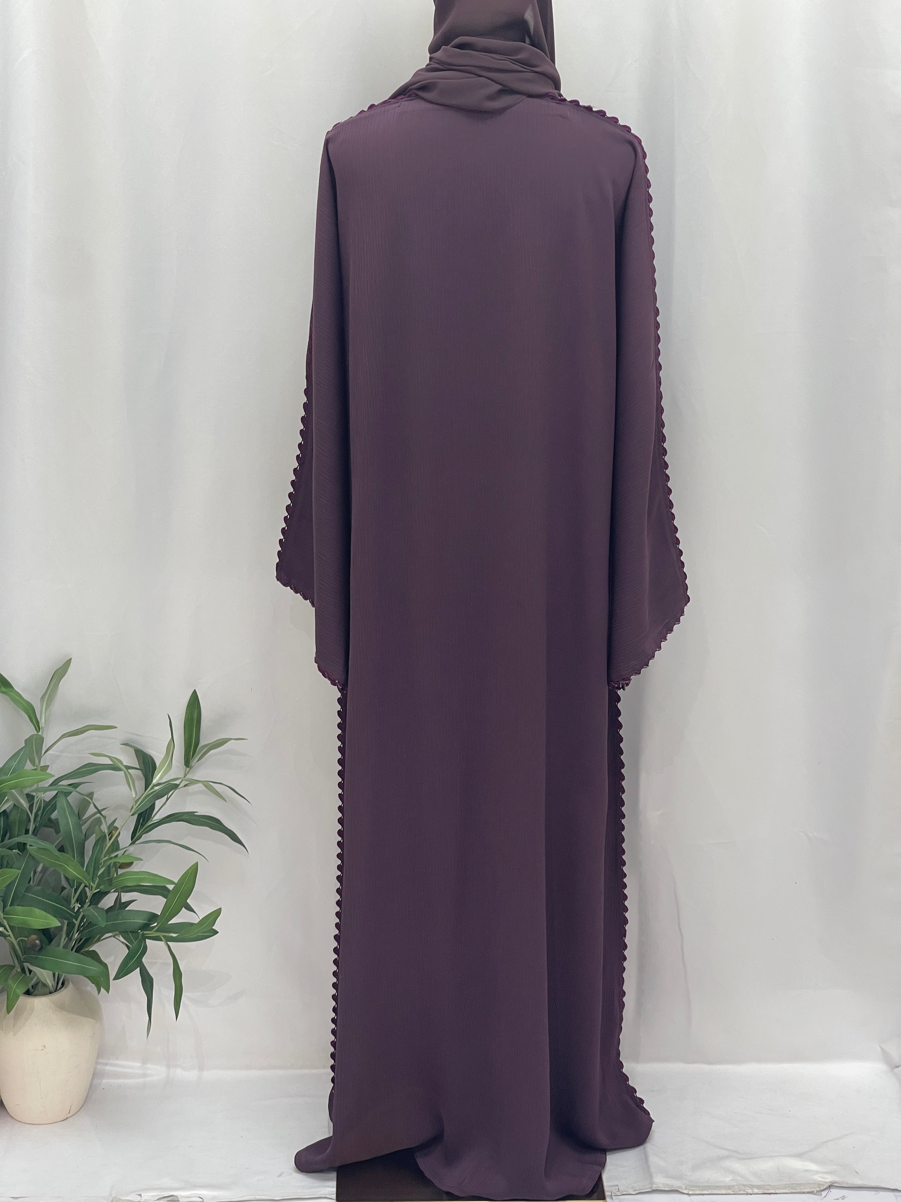 Back view of Palestinian Elegance Ghosoon Abaya in deep plum with scalloped edge detailing