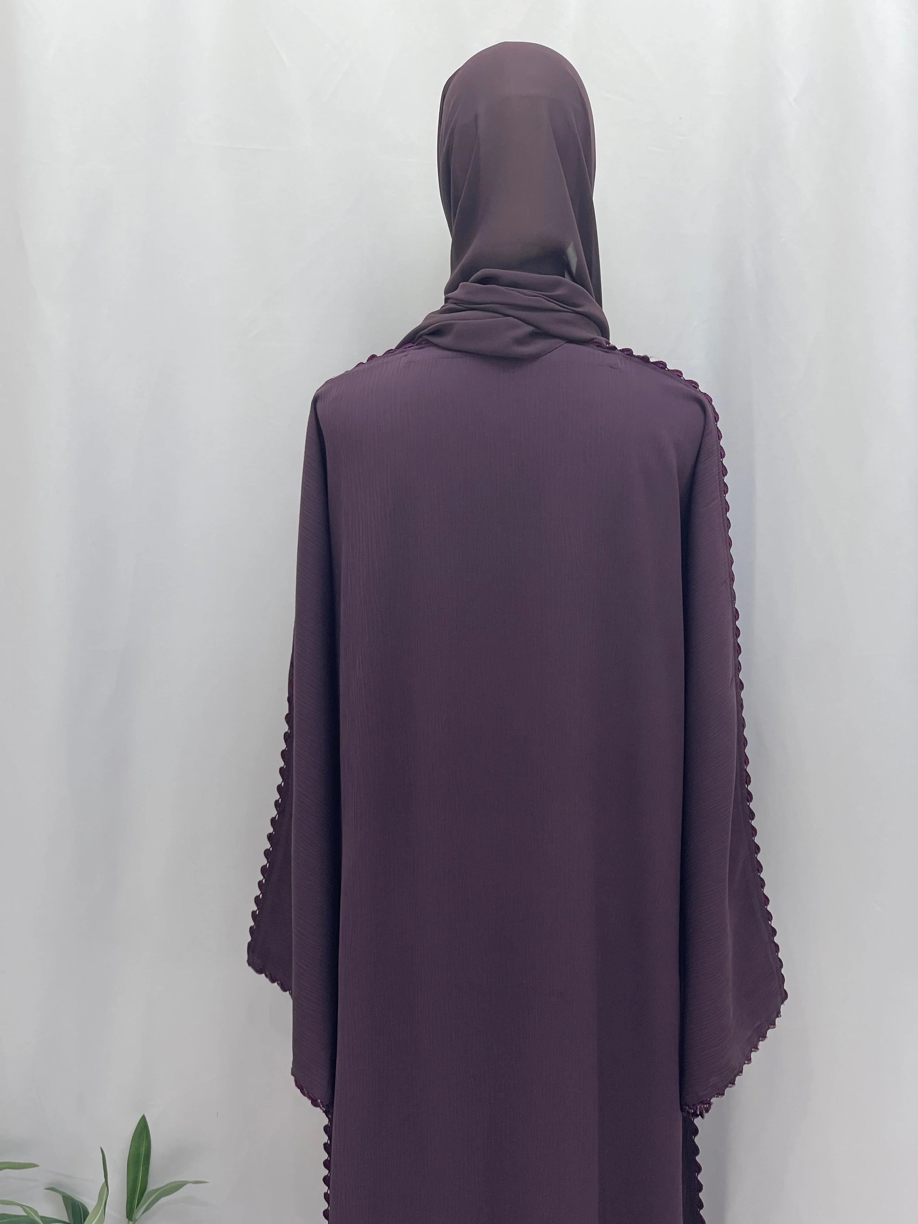 Palestinian Elegance Ghosoon abaya purple back view draped sleeve embroidery