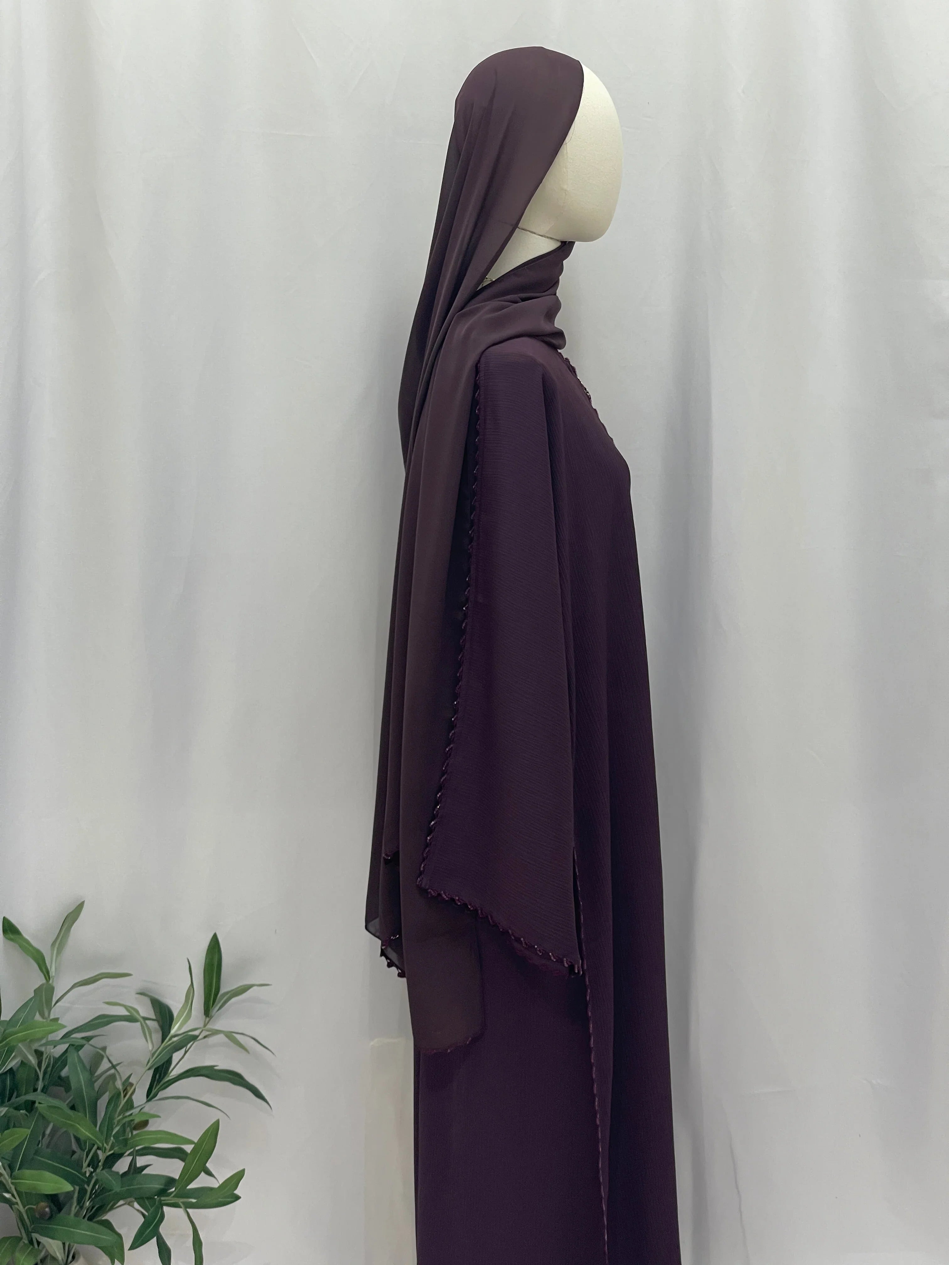 Palestinian Elegance Ghosoon abaya purple side view draped sleeve embroidery