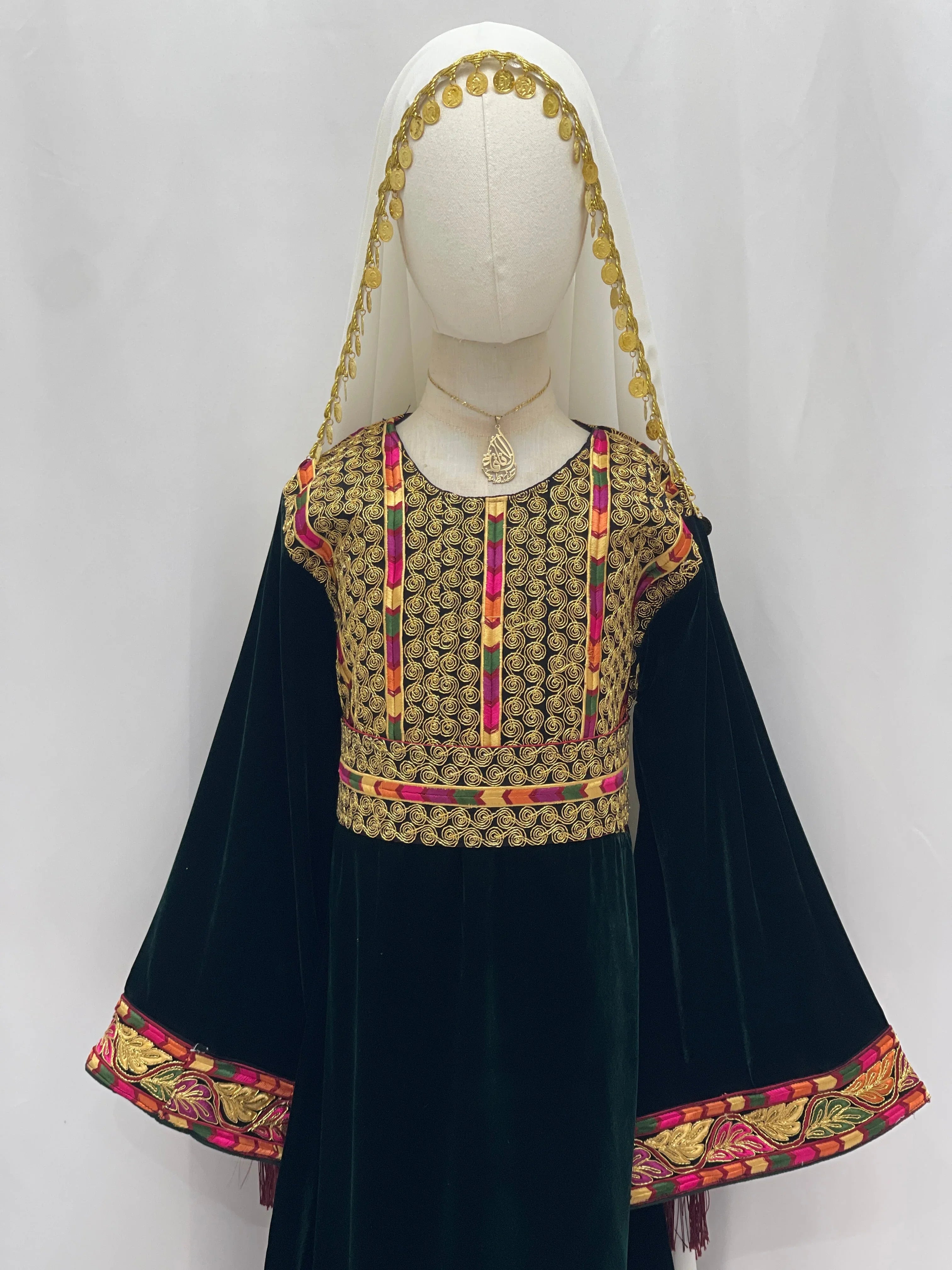 Emerald Velvet Embroidered Qasab Thobe with ornate floral patterns and elegant sleeves