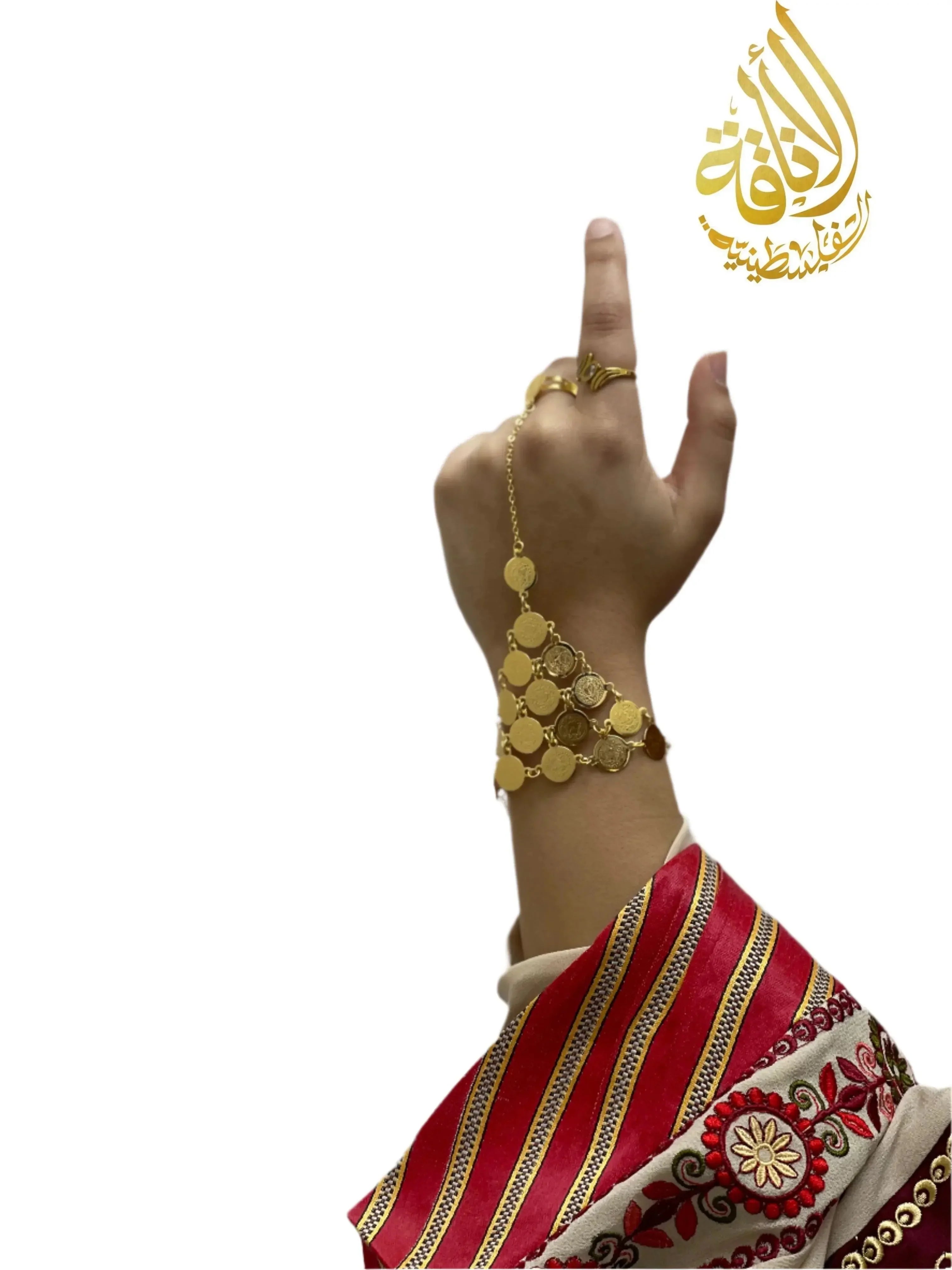 Gold kaff hand jewelry on wrist and finger with traditional clothing sleeve by Palestinian Elegance