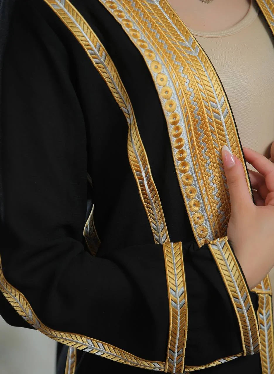 Palestinian Elegance Golden Touch Open Abaya black cardigan with intricate gold embroidered trim and model hand