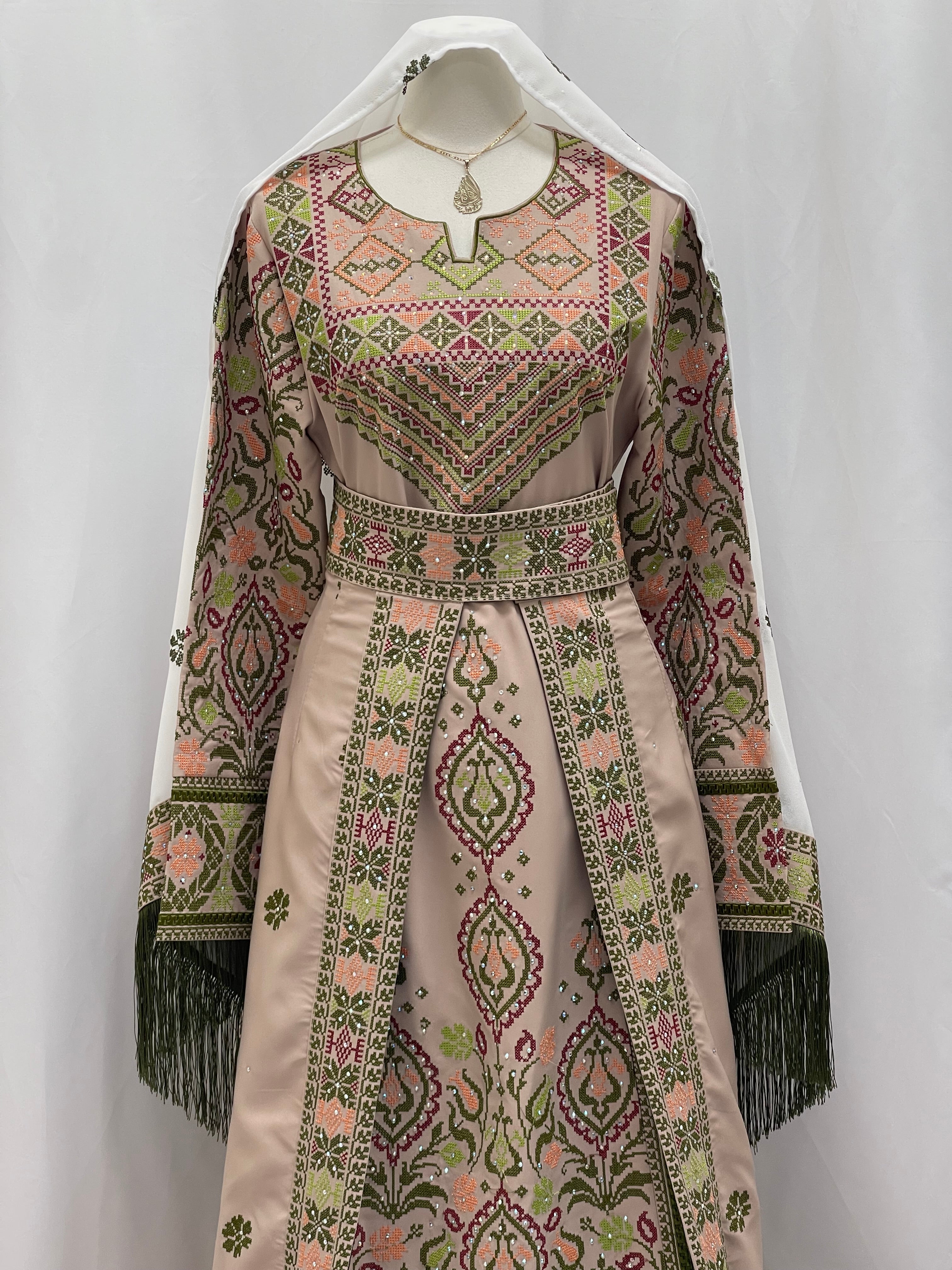 Elegant Green Ruby Embroidered Thobe with intricate designs and matching shawl for cultural events