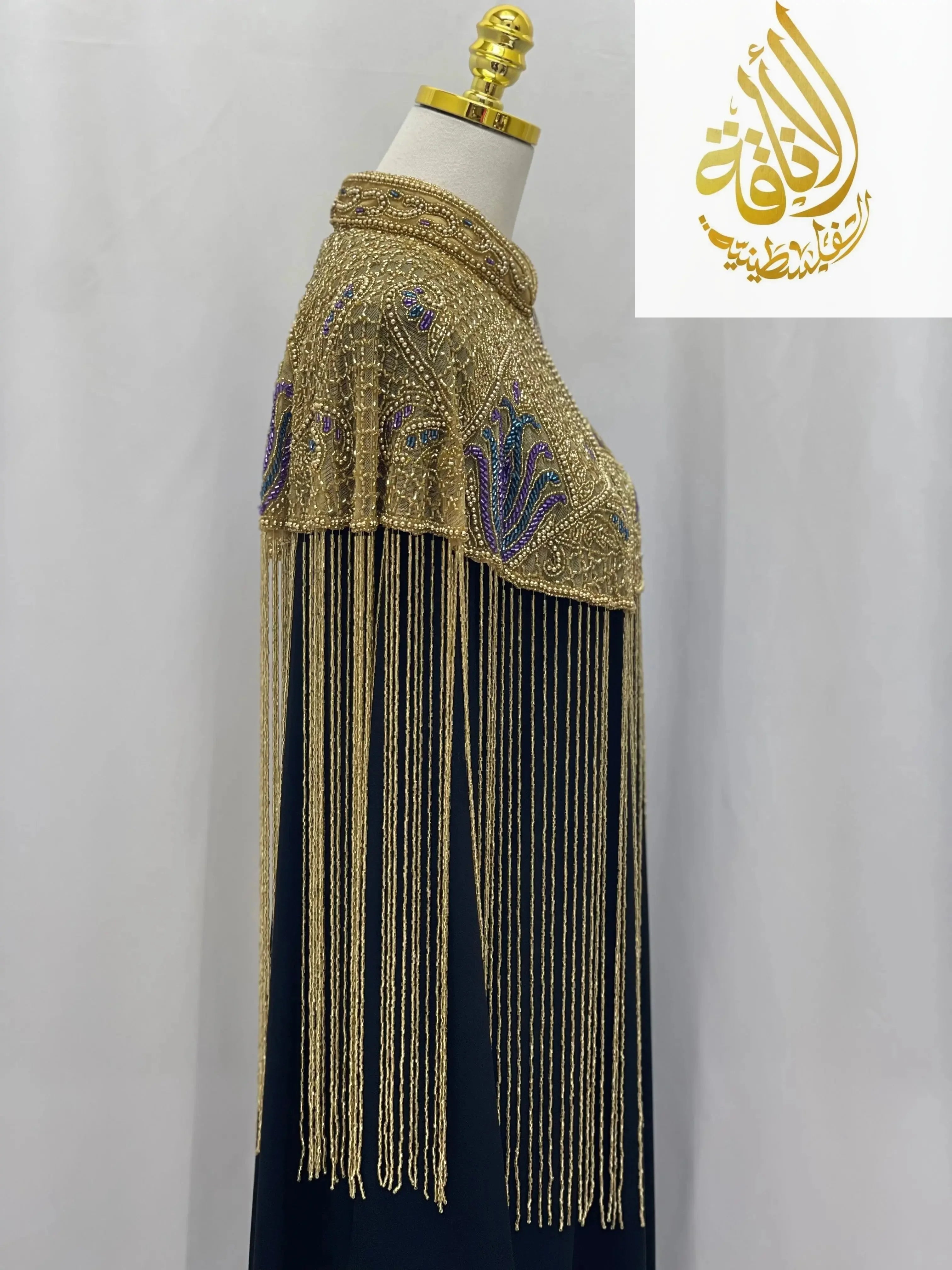 Palestinian Elegance handmade beaded cape cardigan with intricate gold beadwork and long fringe detailing