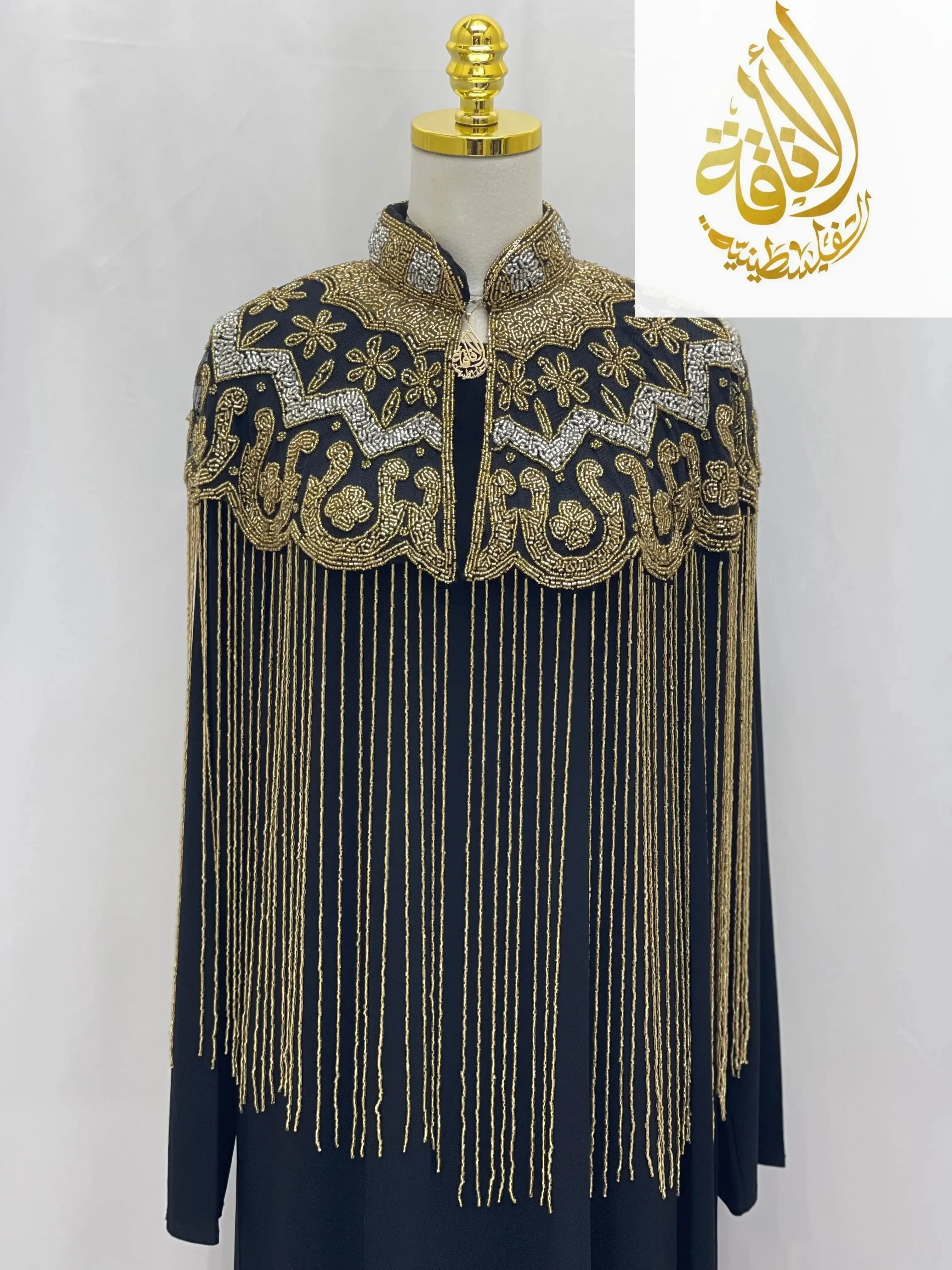 Palestinian Elegance handmade beaded cape with intricate gold and silver beadwork and fringe detailing