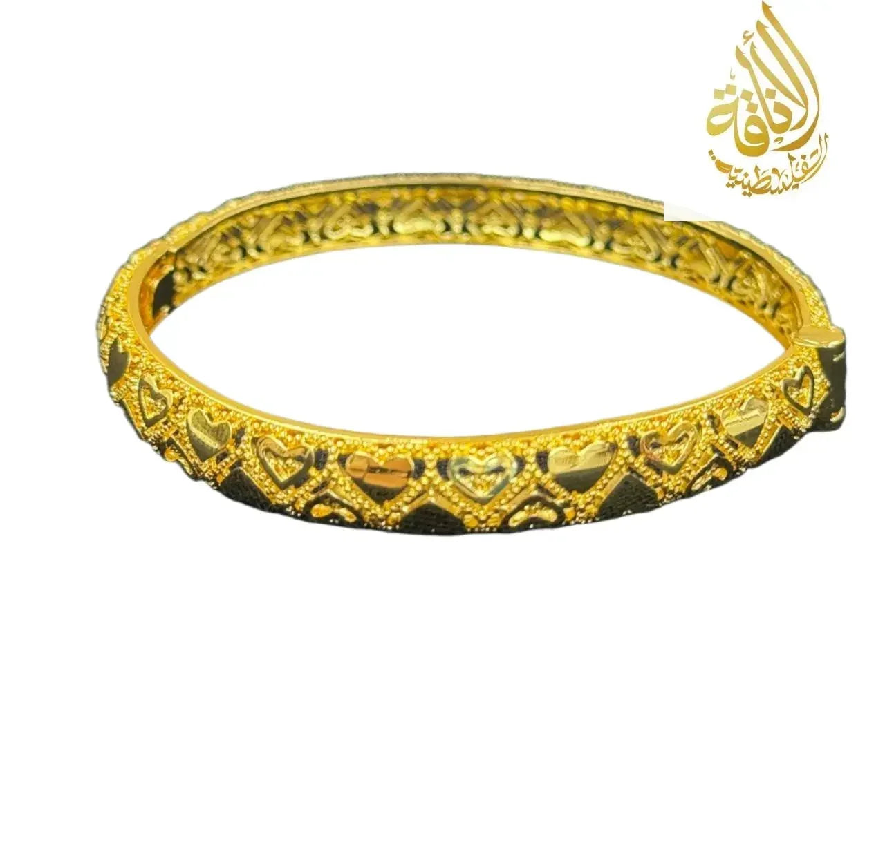 Imitated gold heart design gold bangle bracelet by Palestinian Elegance with intricate heart patterns