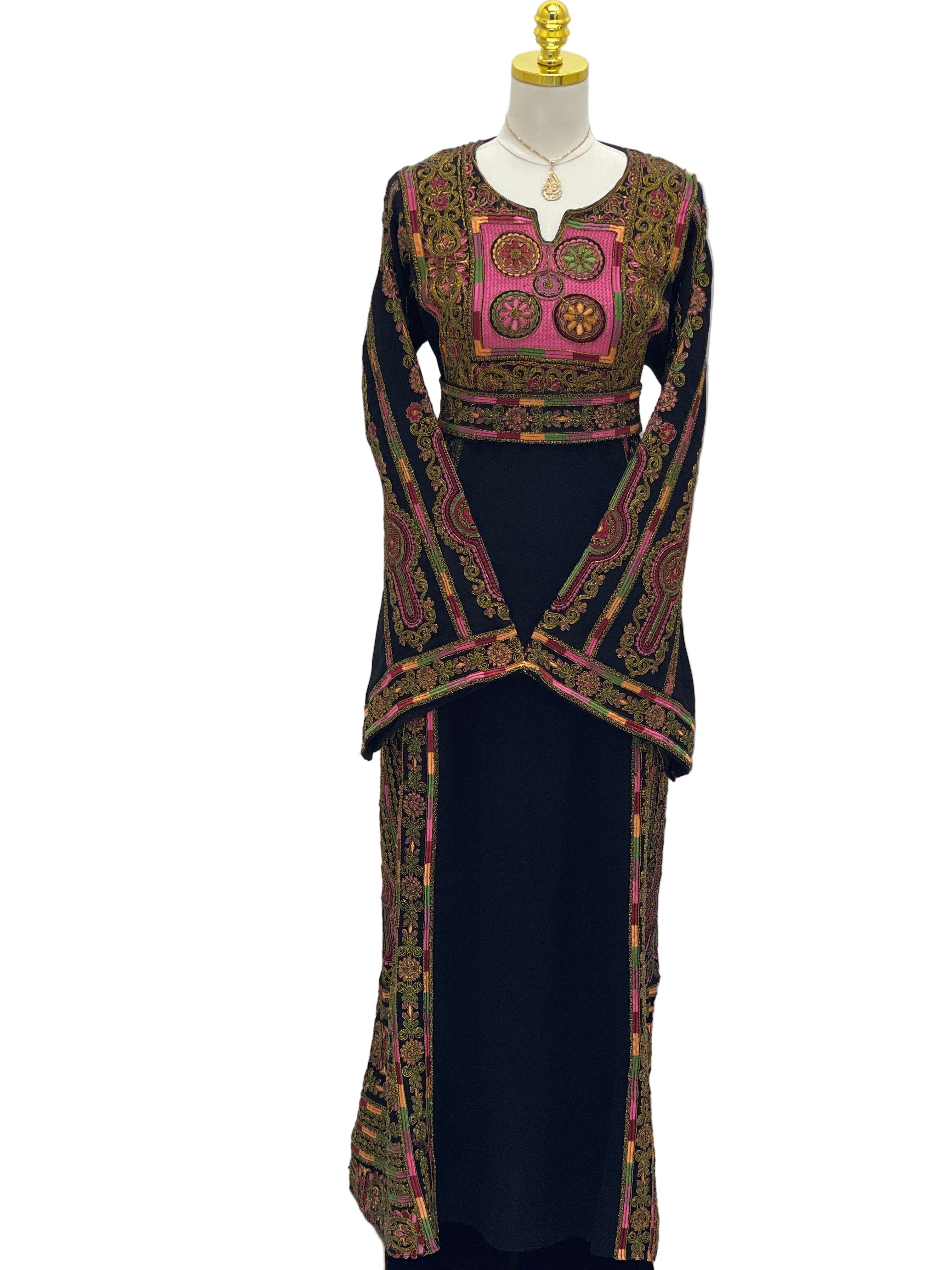 Heritage Glow Bream Embroidered Thoub. Palestinian Elegance black thobe with pink gold embroidery on bodice and long sleeves