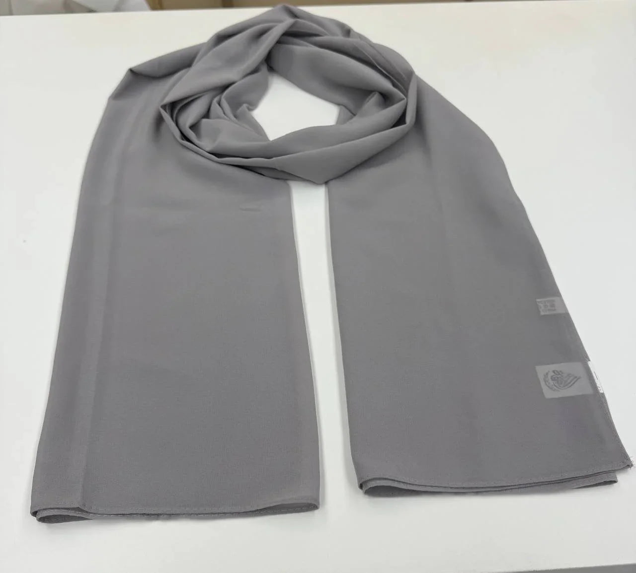 High quality Chiffon Hijab in soft gray color, ideal for versatile styling and comfort