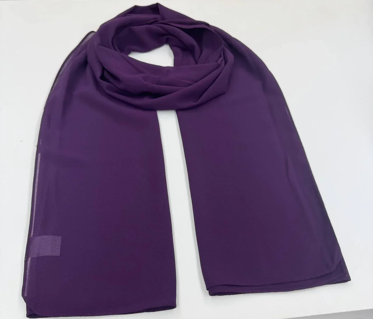 High quality Chiffon Hijab in rich purple color, soft and lightweight for everyday elegance.