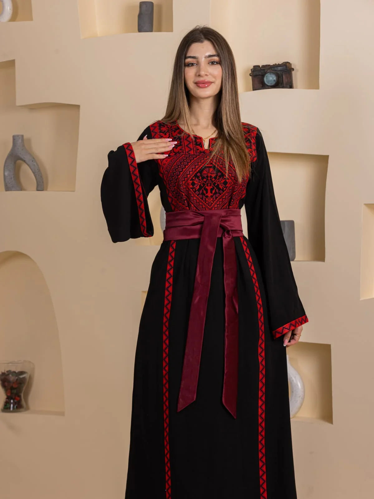 Huda Simply Embroidered Thoub black Palestinian thobe with red geometric embroidery and maroon sash