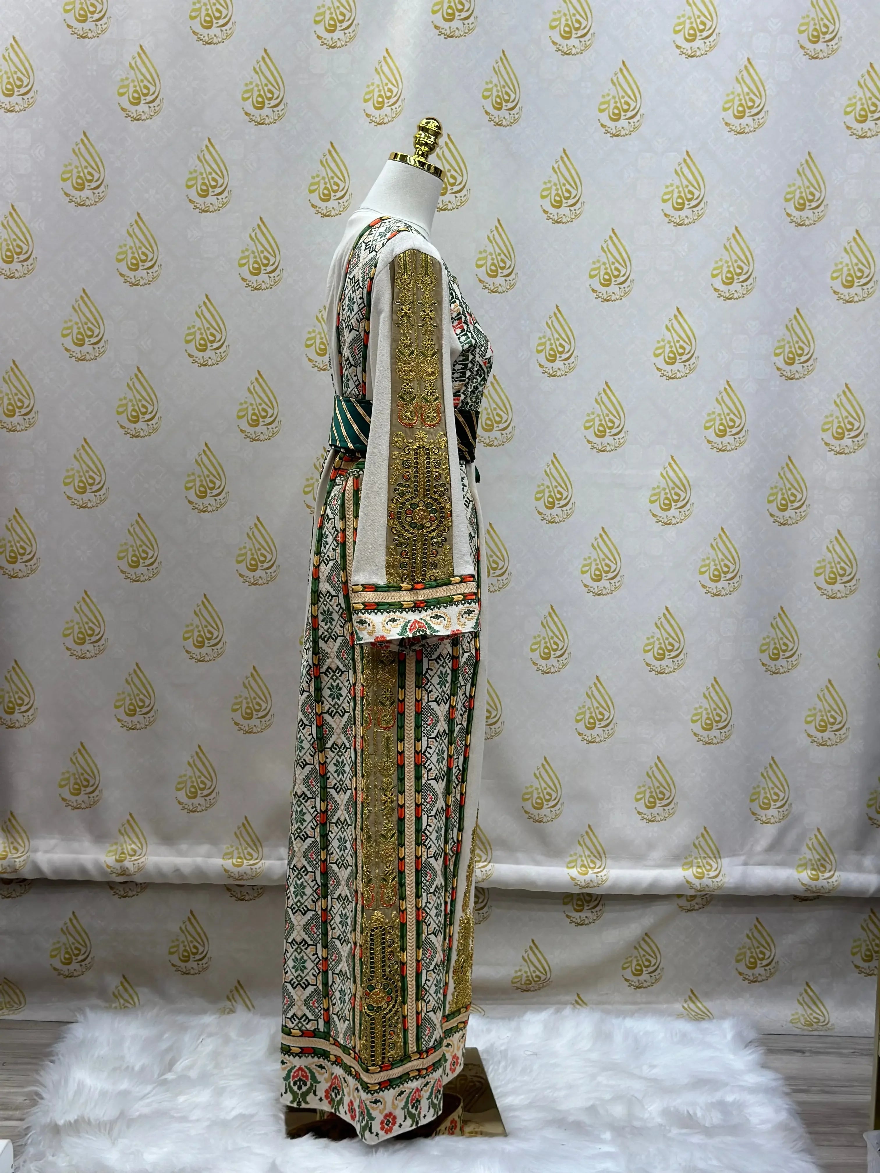 Side view of an embroidered Palestinian thobe with intricate traditional designs by Palestinian Elegance