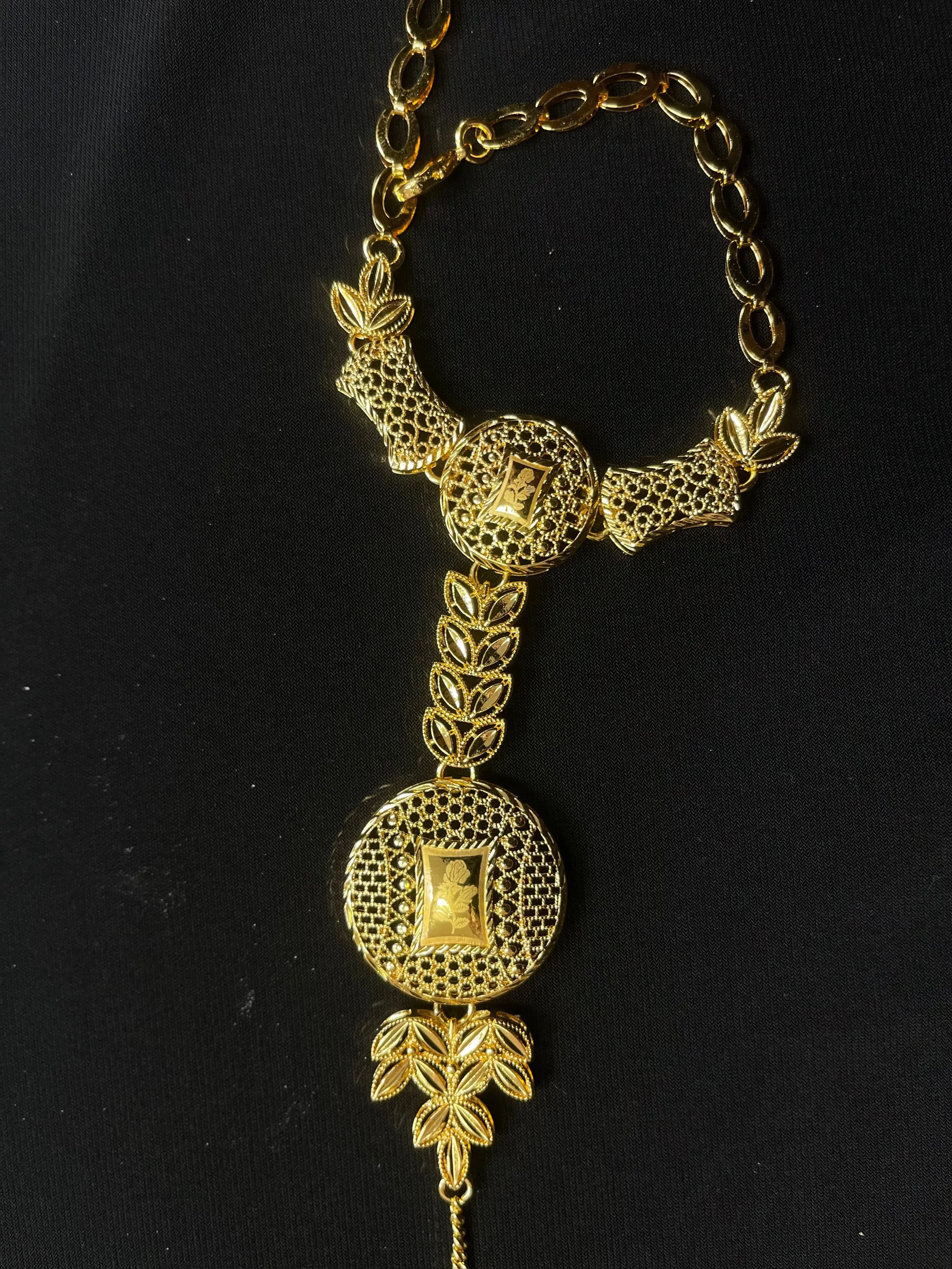 Imitated Gold Bracelet with Ring Design by Palestinian Elegance featuring intricate floral patterns