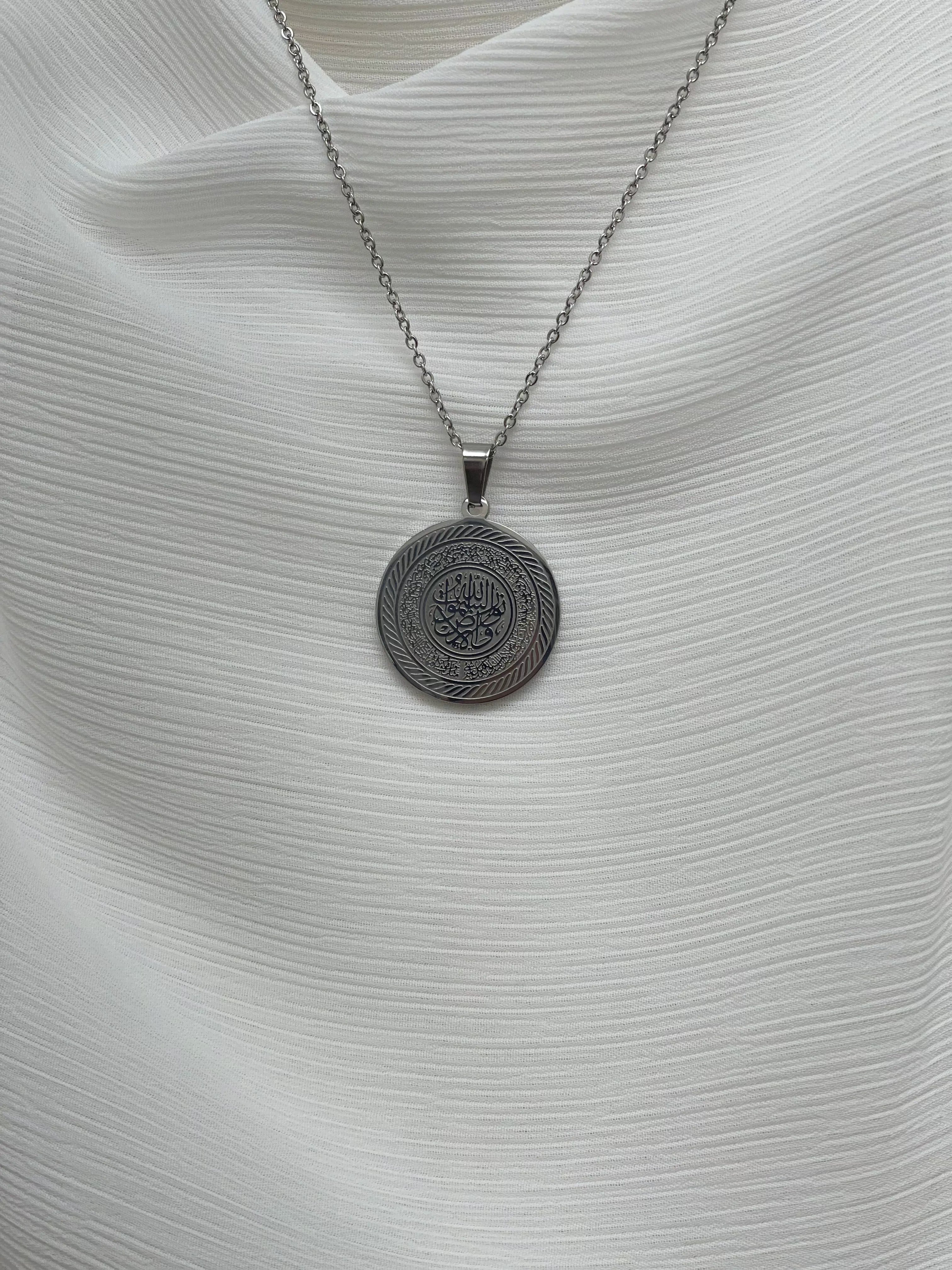 Palestinian Elegance elegant silver circle necklace with intricate design on imitated gold pendant