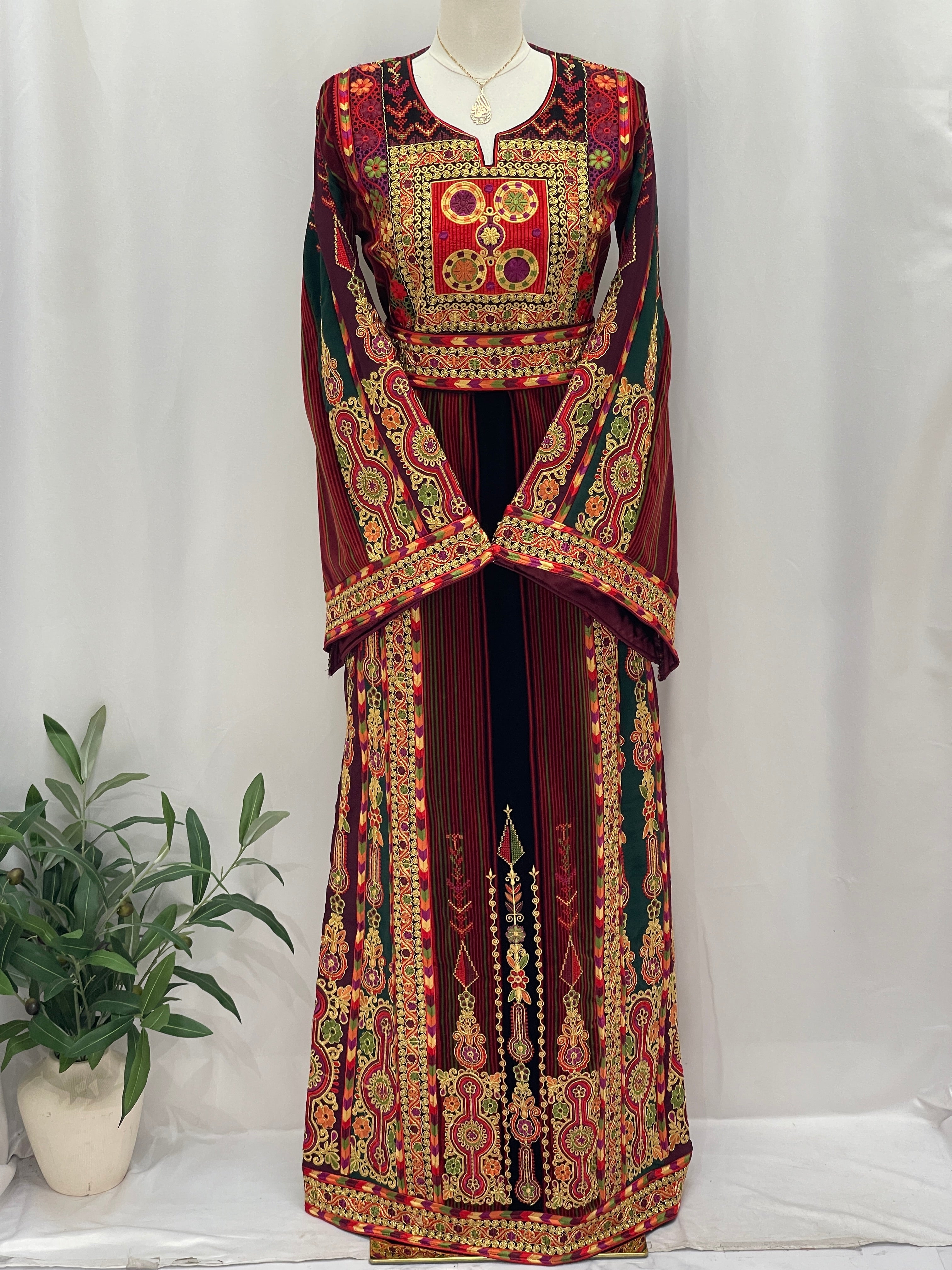 Palestinian Velvet Malaka Embroidered Thobe by Palestinian Elegance with intricate traditional embroidery in red and gold