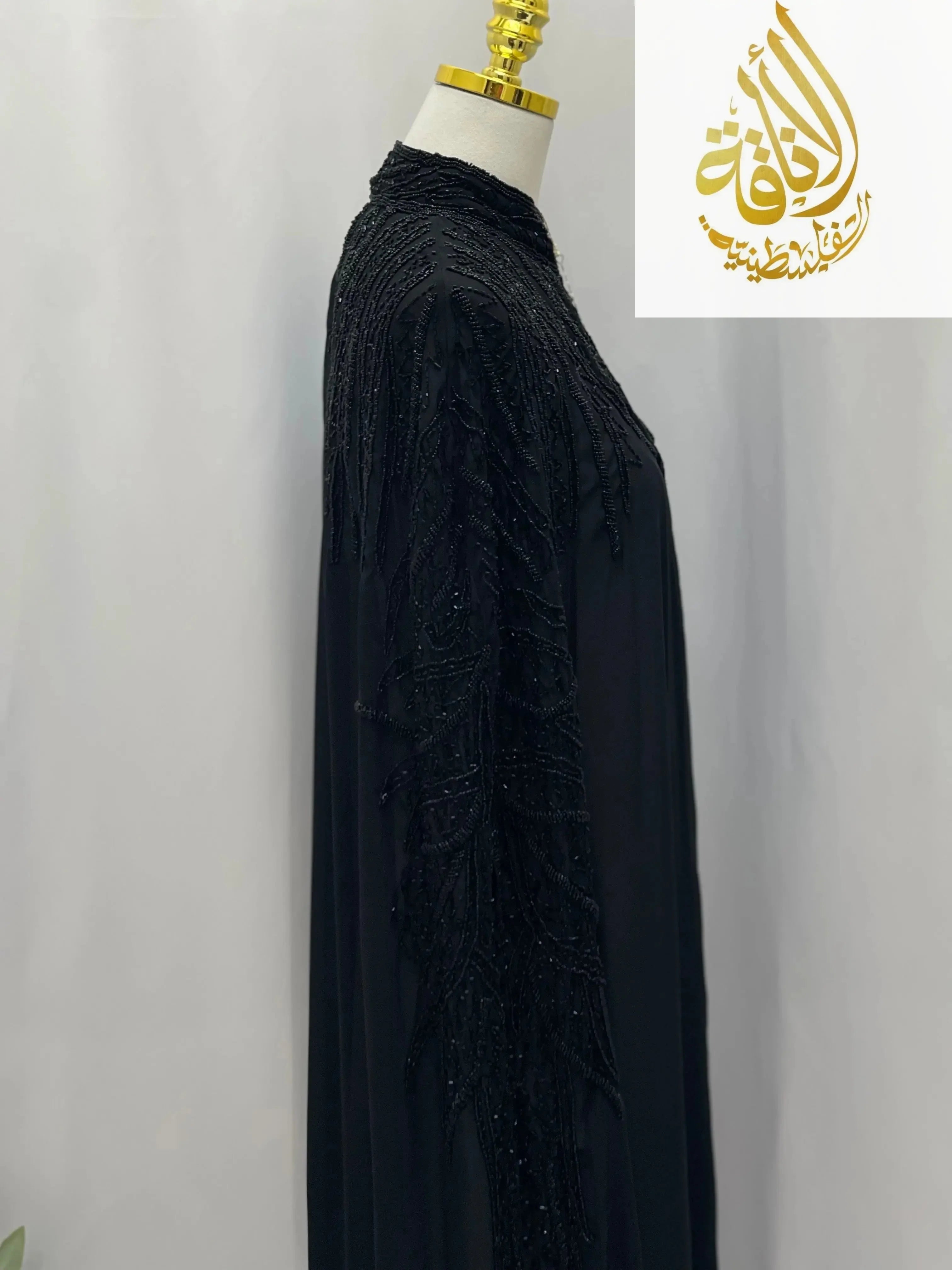 Black Karam Fancy Beads Cape cardigan by Palestinian Elegance with intricate beadwork on shoulder and sleeve