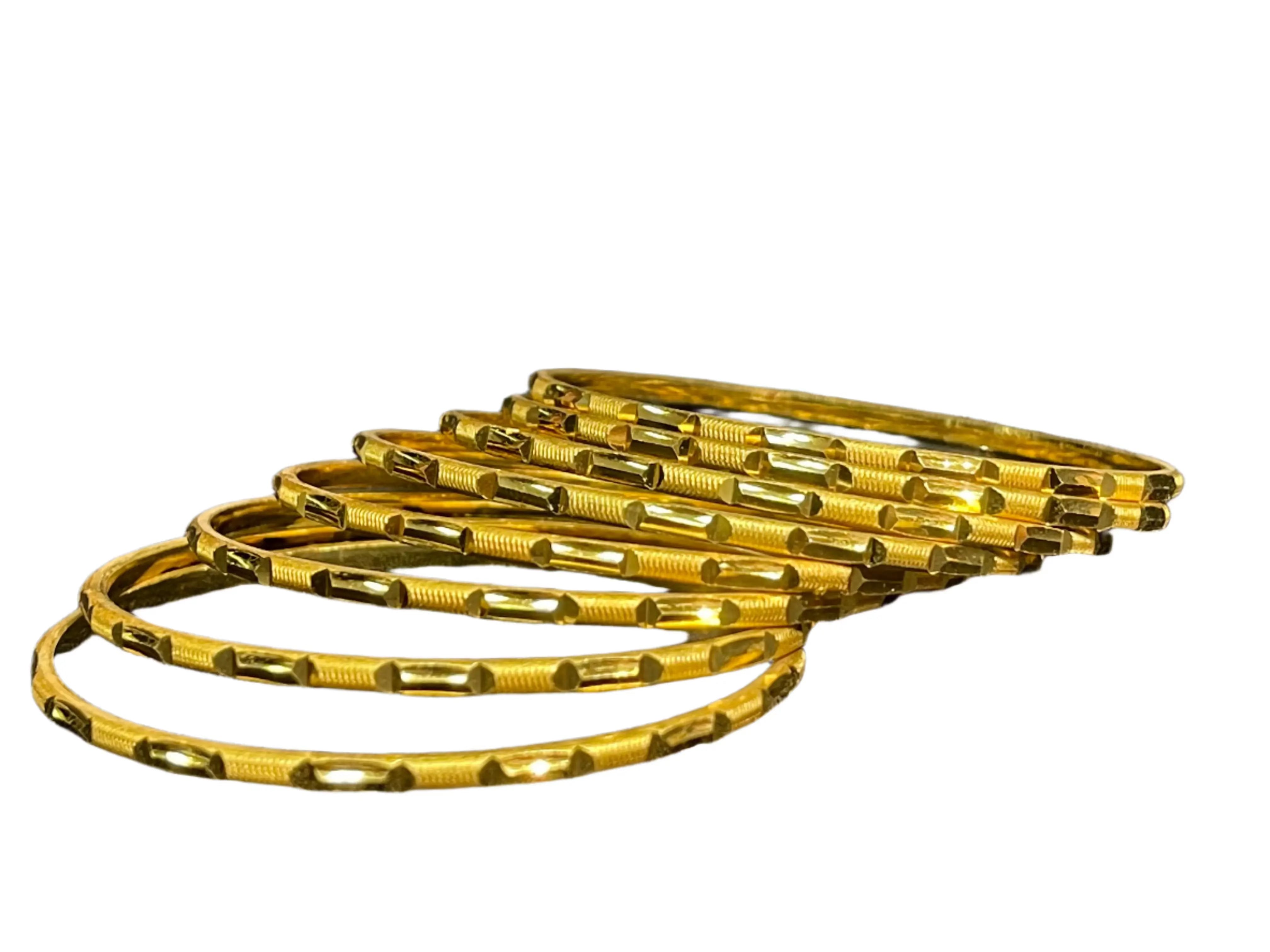 Palestinian Elegance Karmela Thin Bangles in imitated gold with intricate engraved details