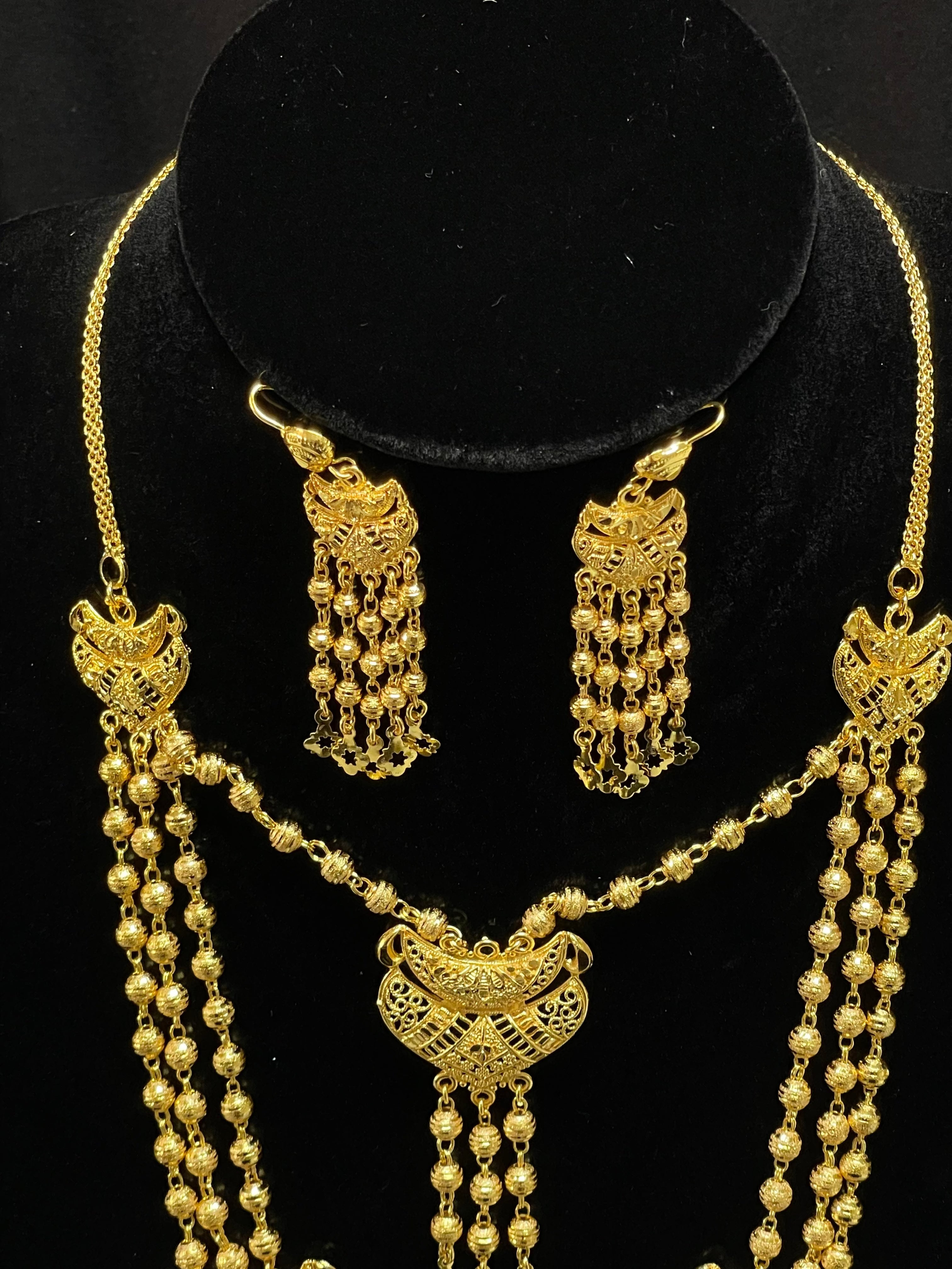 Palestinian Elegance imitated gold layered gold necklace set with intricate detailed design and matching earrings