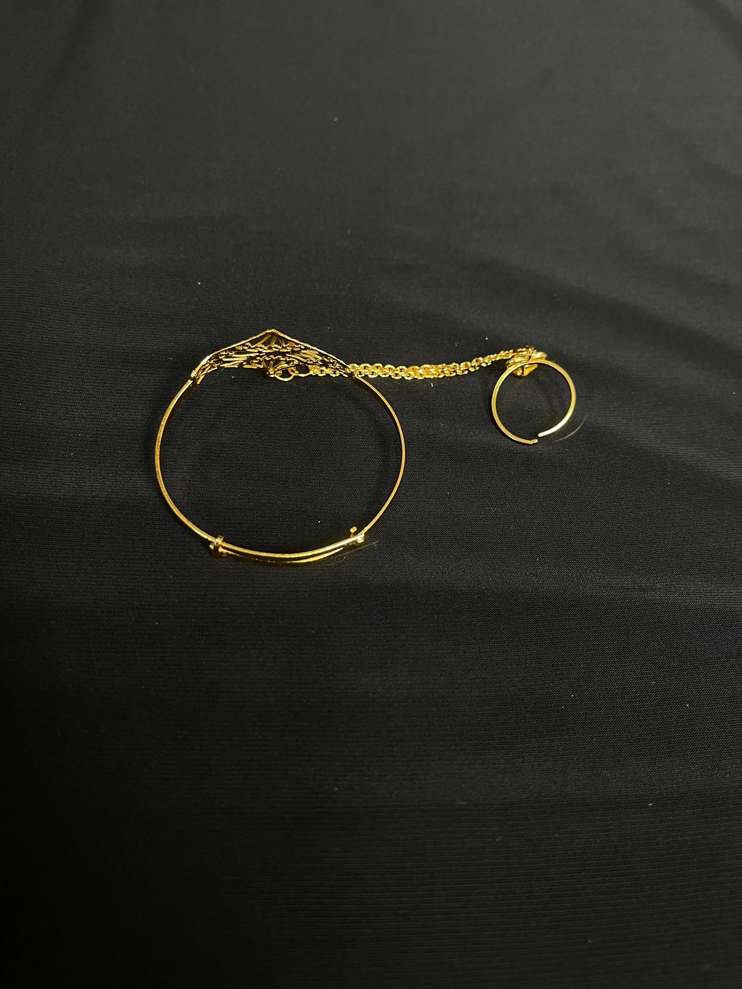 Kids Imitated Gold Bracelet with Adjustable Ring by Palestinian Elegance on black background