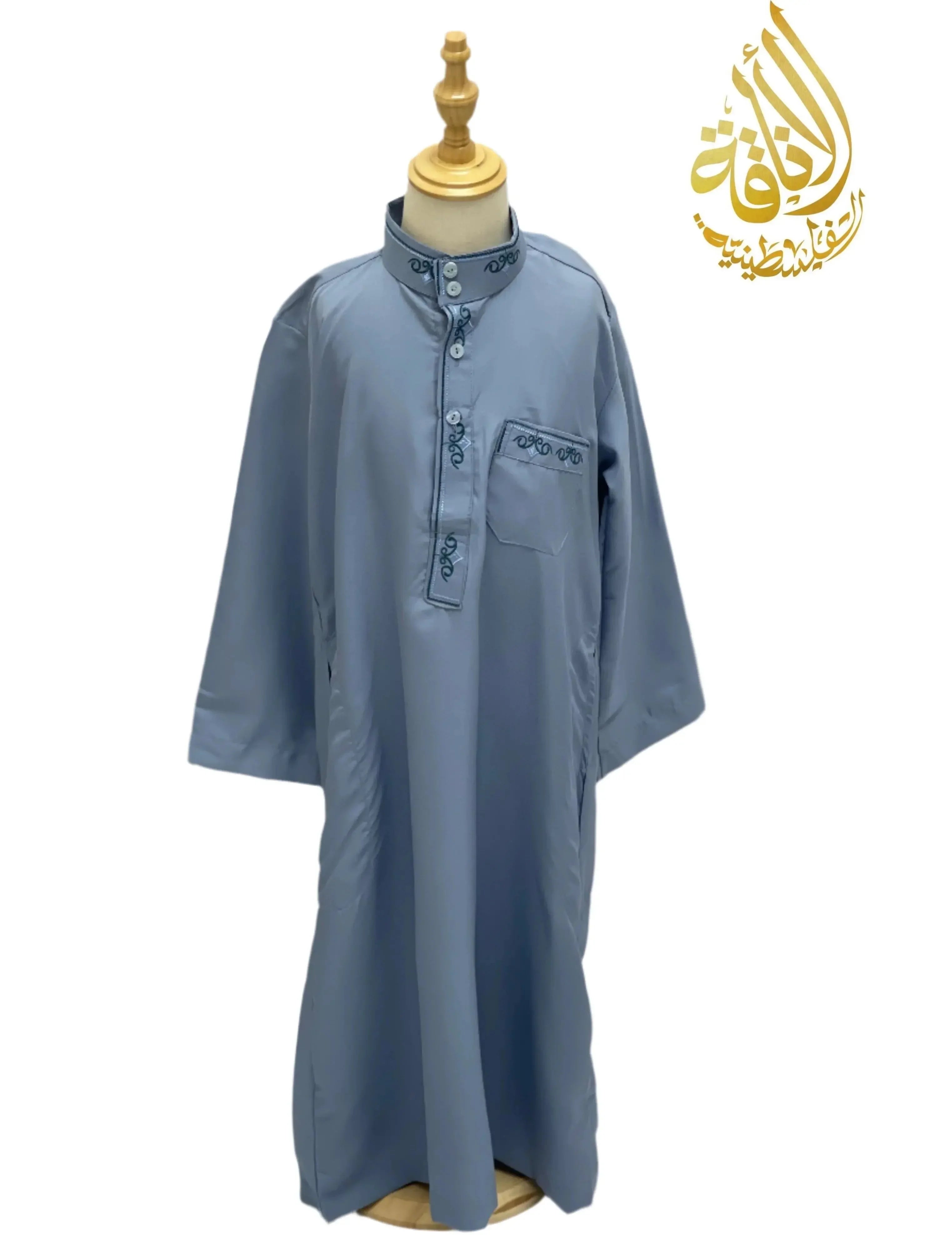Palestinian Elegance kids embroidered thobe in blue with detailed embroidery on collar and chest pocket