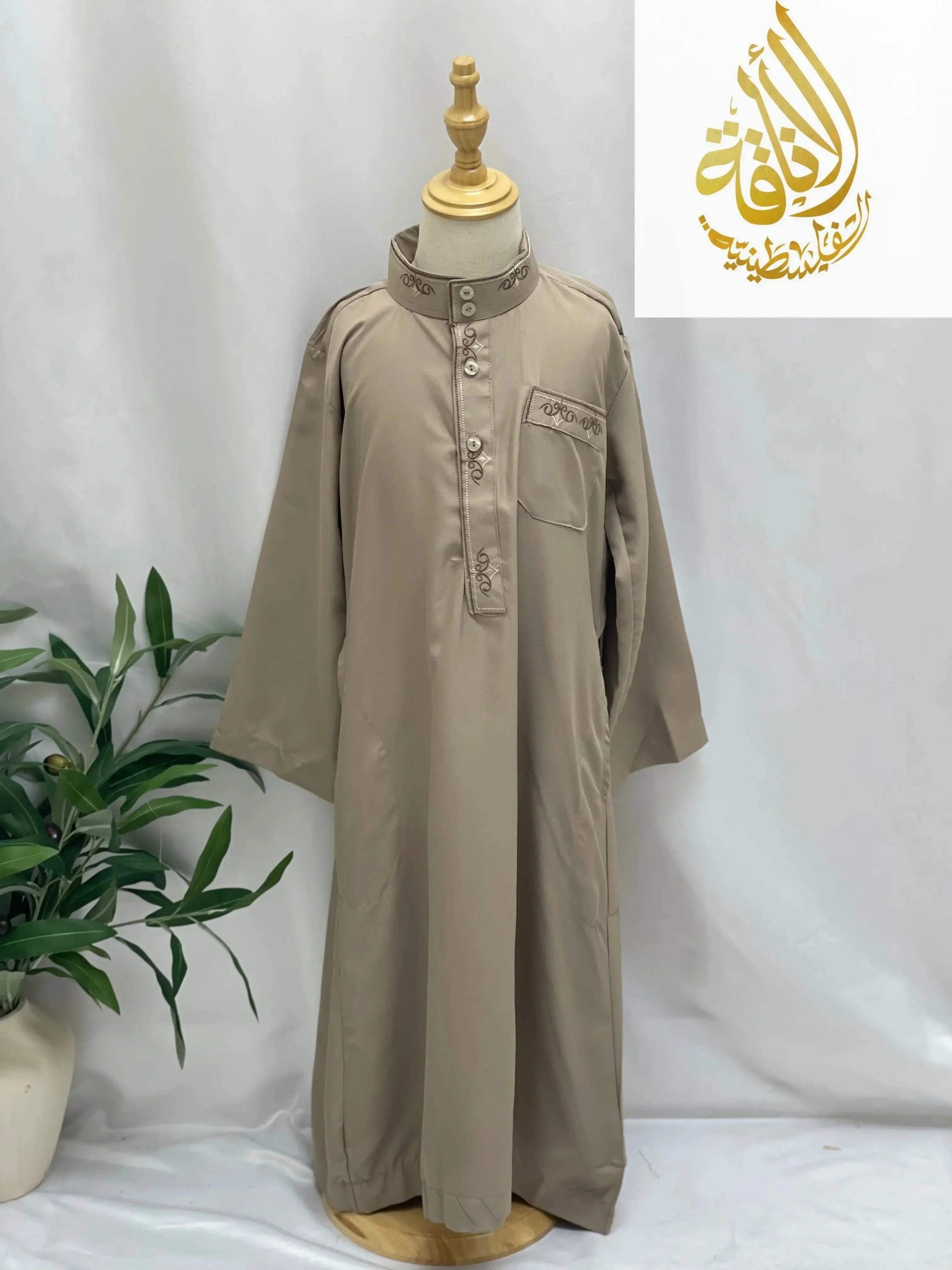 Kids embroidered thobe in beige with detailed embroidery on collar and pocket by Palestinian Elegance