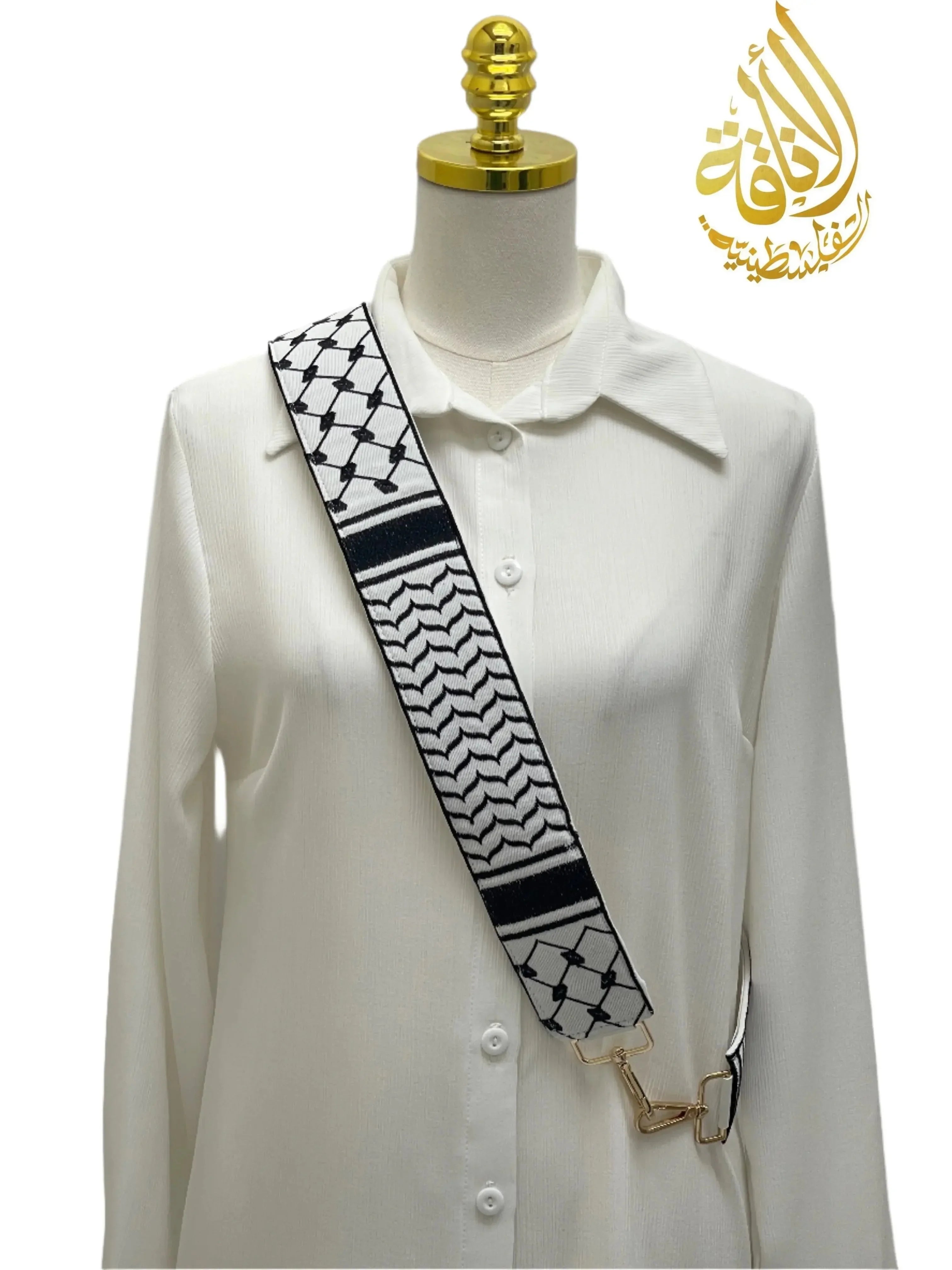 Kuffia Embroidered Purse Strap in black and white worn over white shirt by Palestinian Elegance