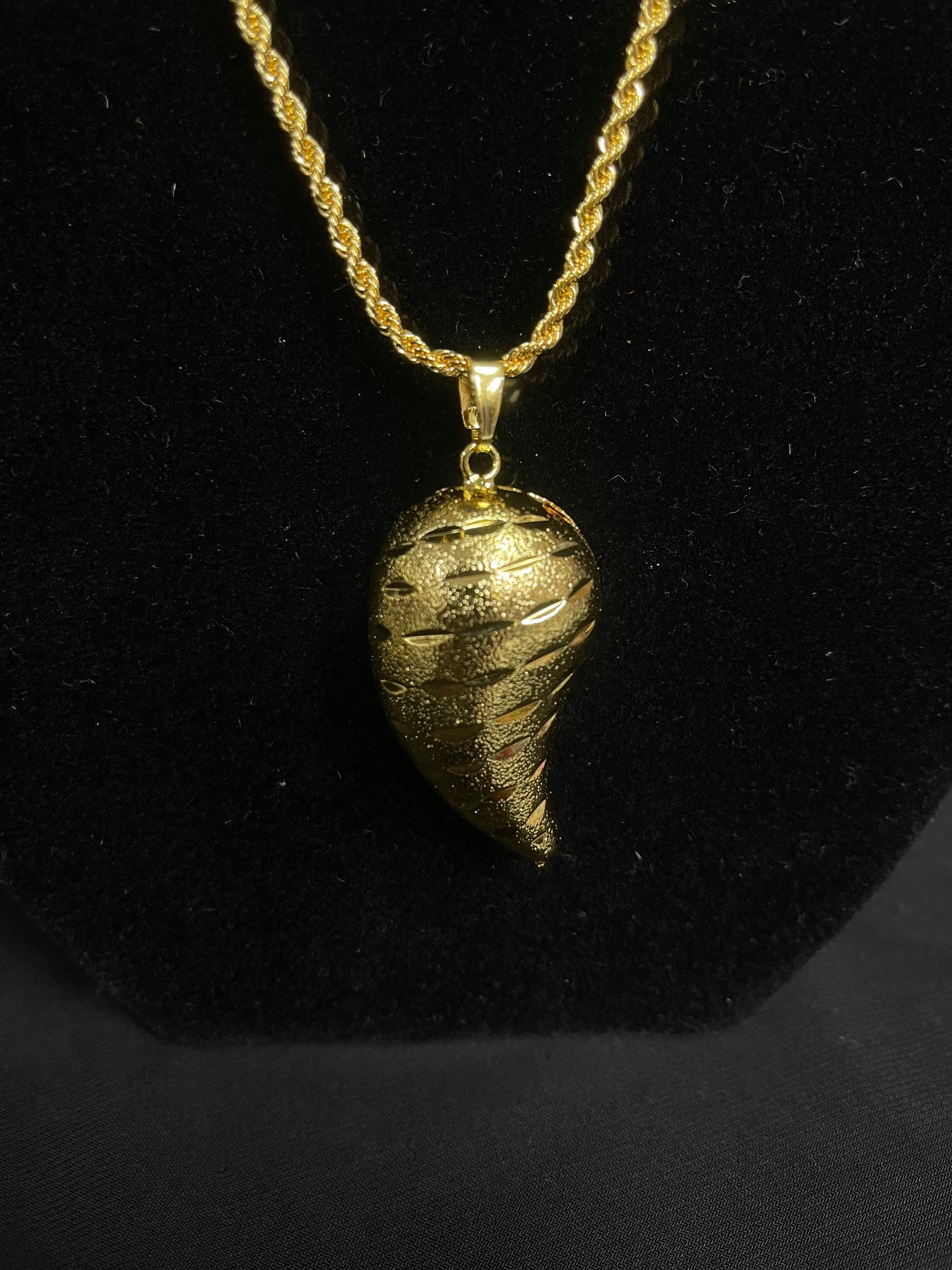 Large Almond Gold Pendant on a twisted chain necklace by Palestinian Elegance in imitated gold