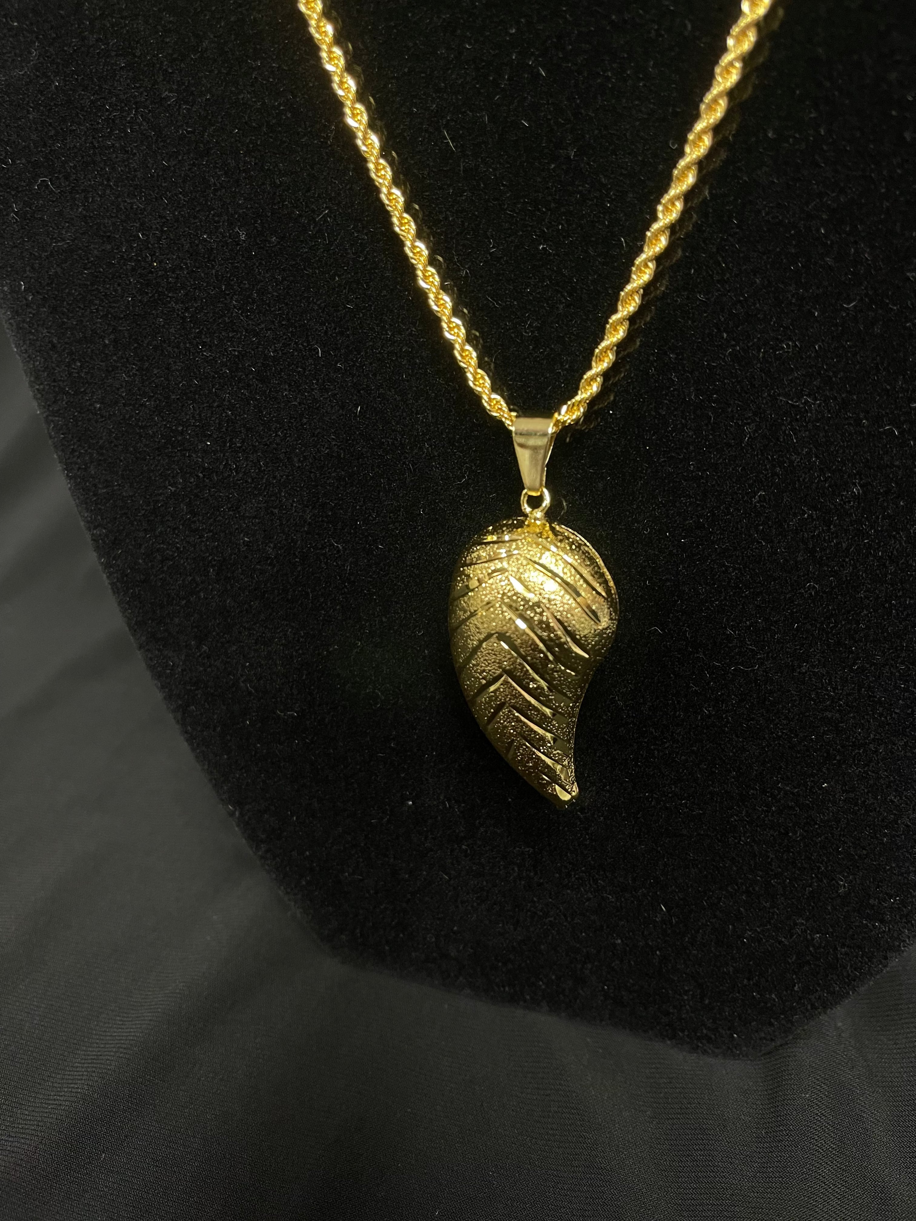 Large Almond Pendant in imitated gold on a twisted chain by Palestinian Elegance