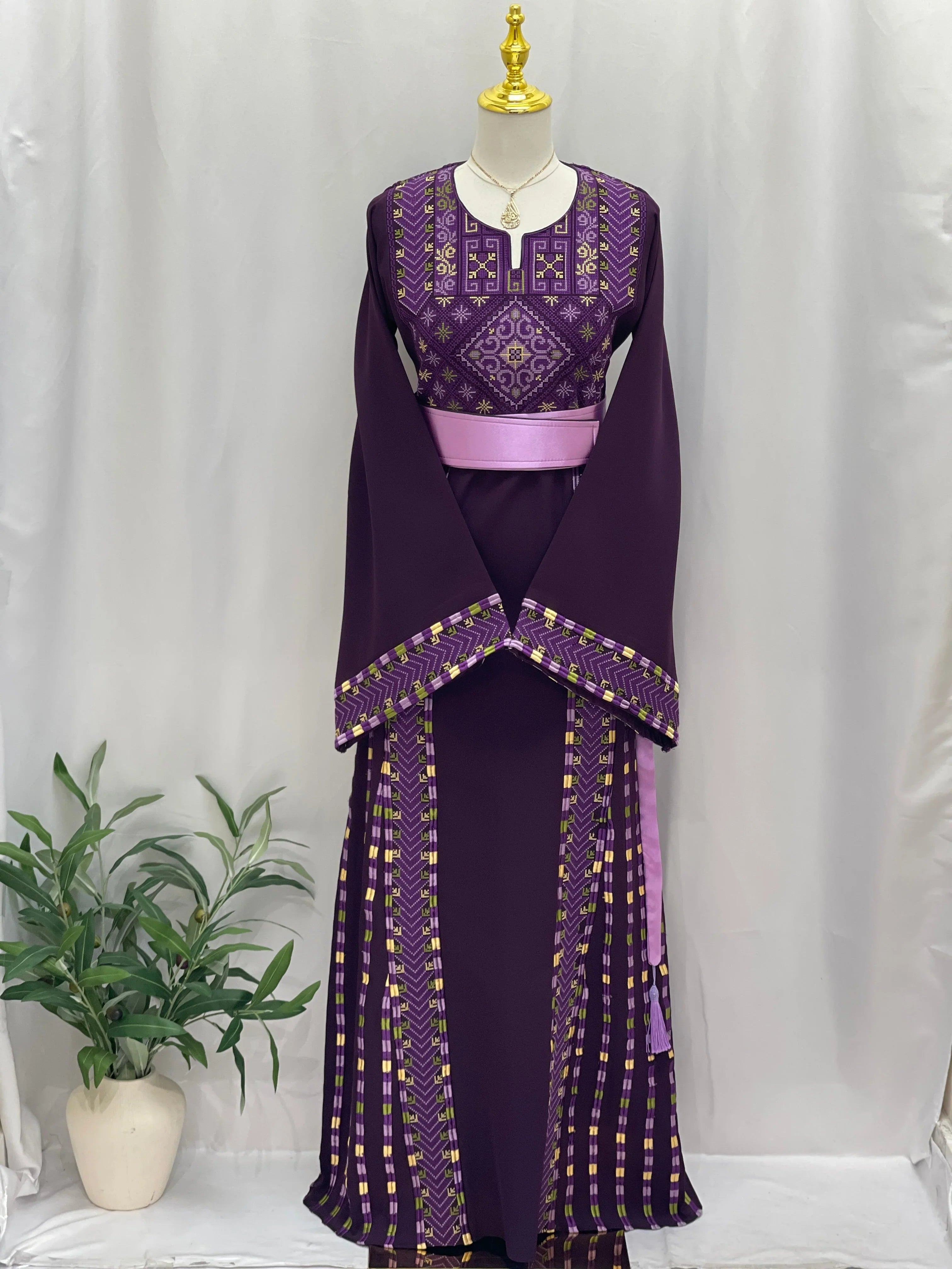 Lavender Heritage Embroidered Thobe with intricate designs and elegant sleeves, perfect for special occasions