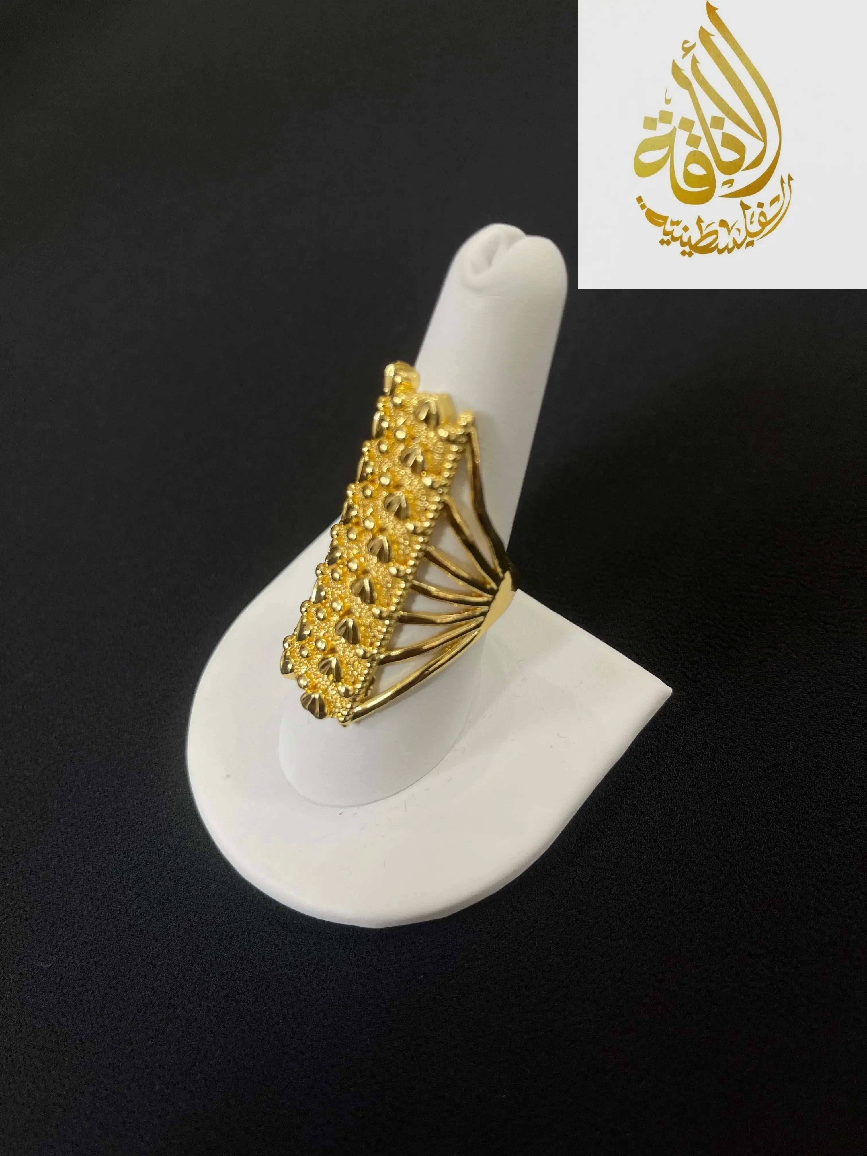 Palestinian Elegance imitated gold Layered Ring with Double Rowed Hearts on white display stand