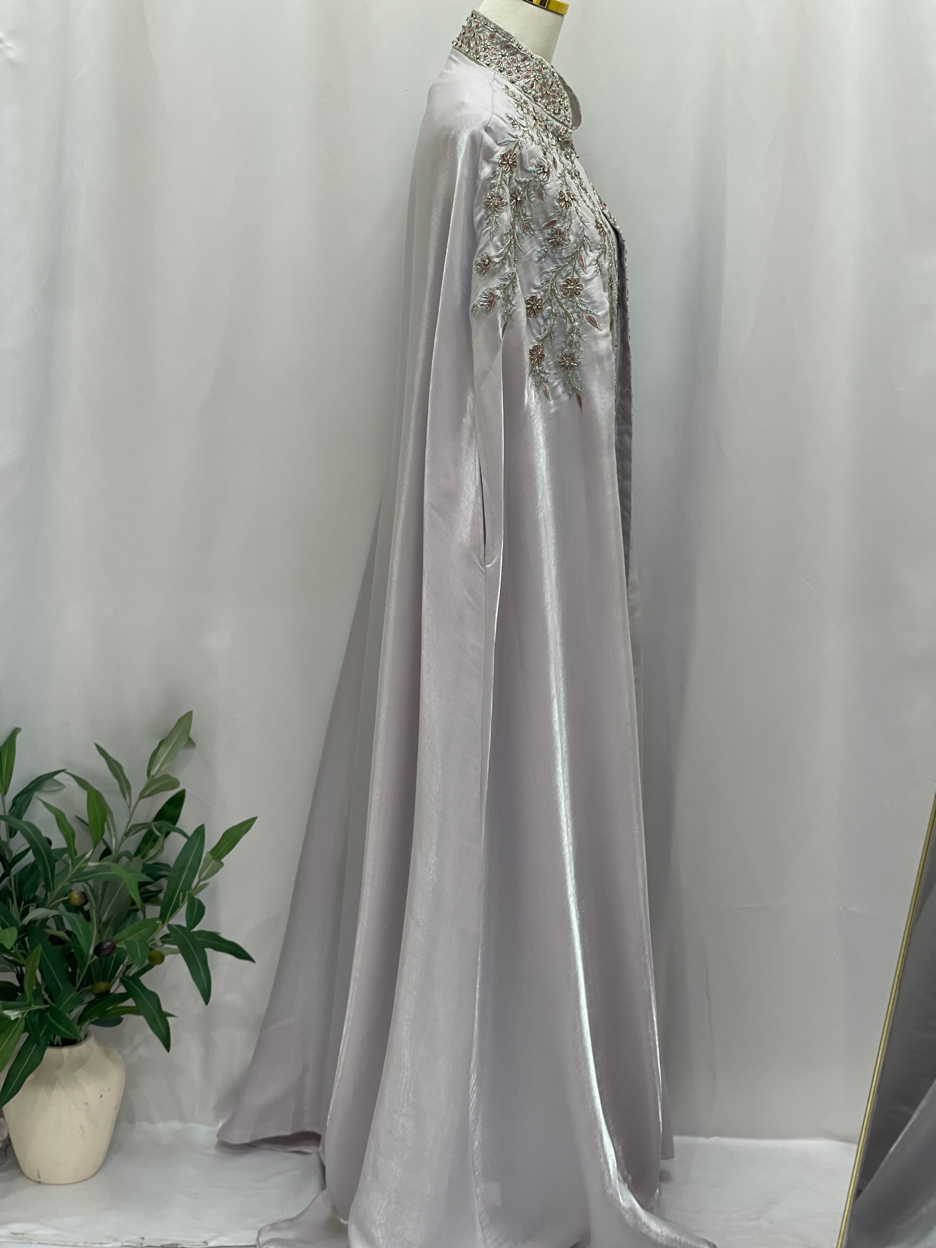 Palestinian Elegance Layla Fancy kaftan in silver with intricate embroidery and flowing design
