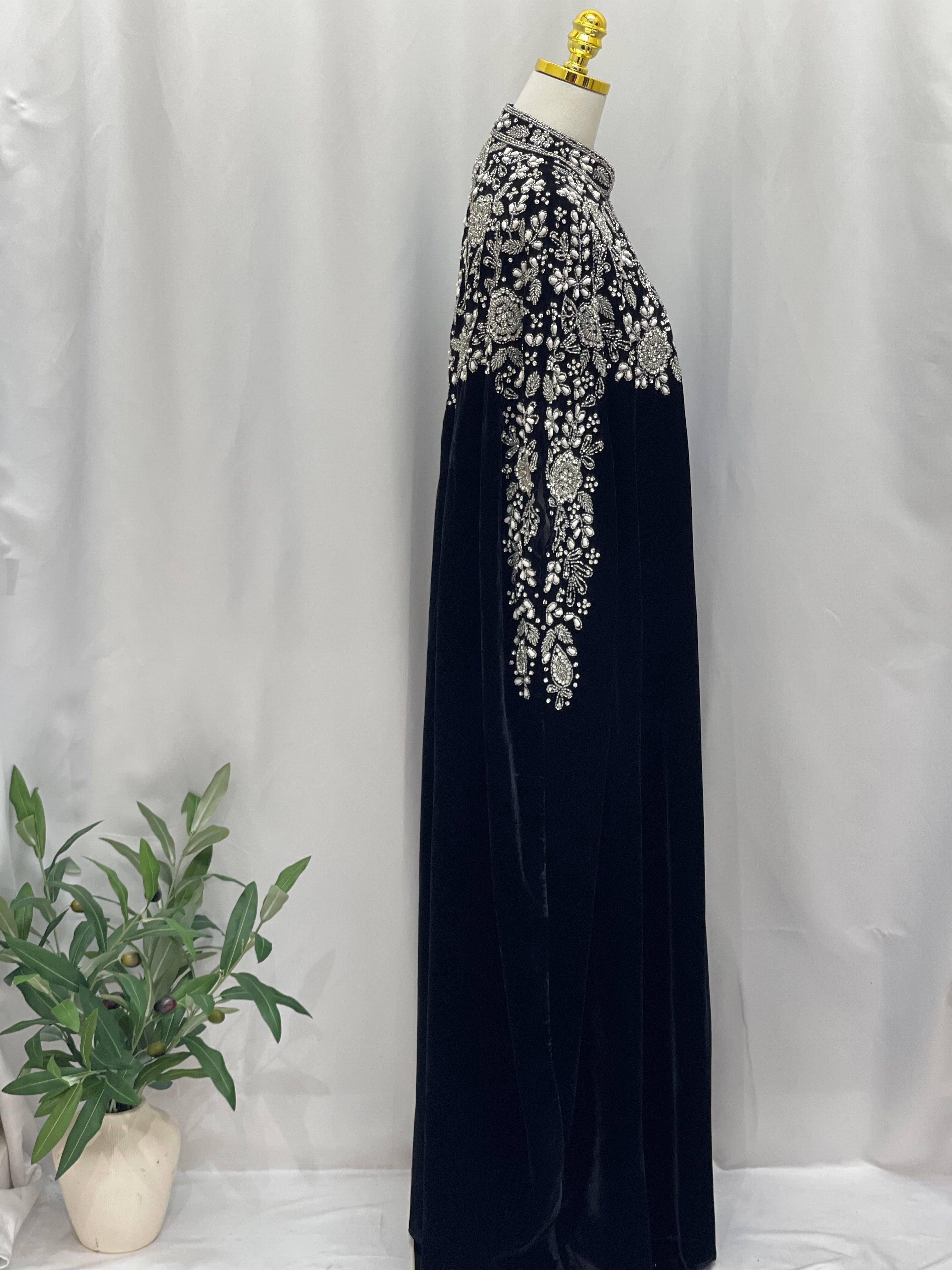 Palestinian Elegance Velvet Embellished Cape cardigan in black velvet with intricate white embroidery