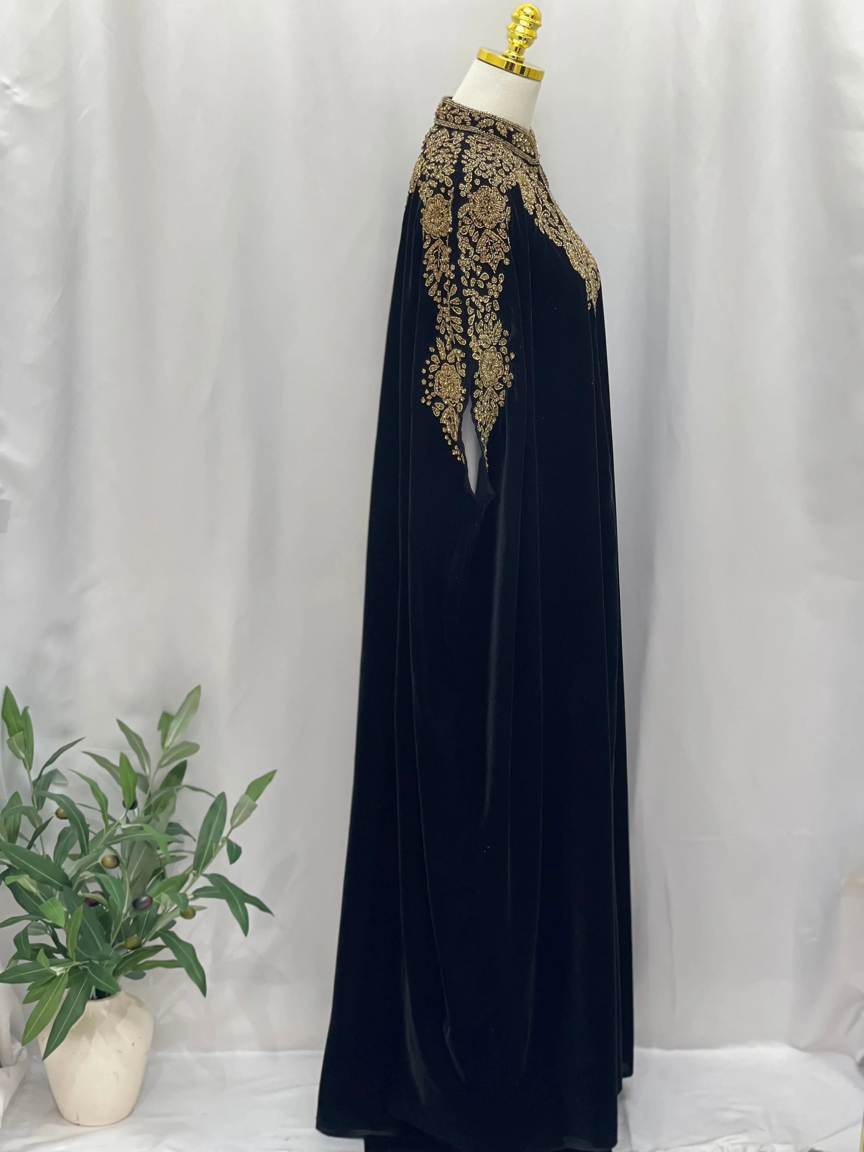 Palestinian Elegance Velvet Embellished Cape cardigan in black velvet with intricate gold embroidery