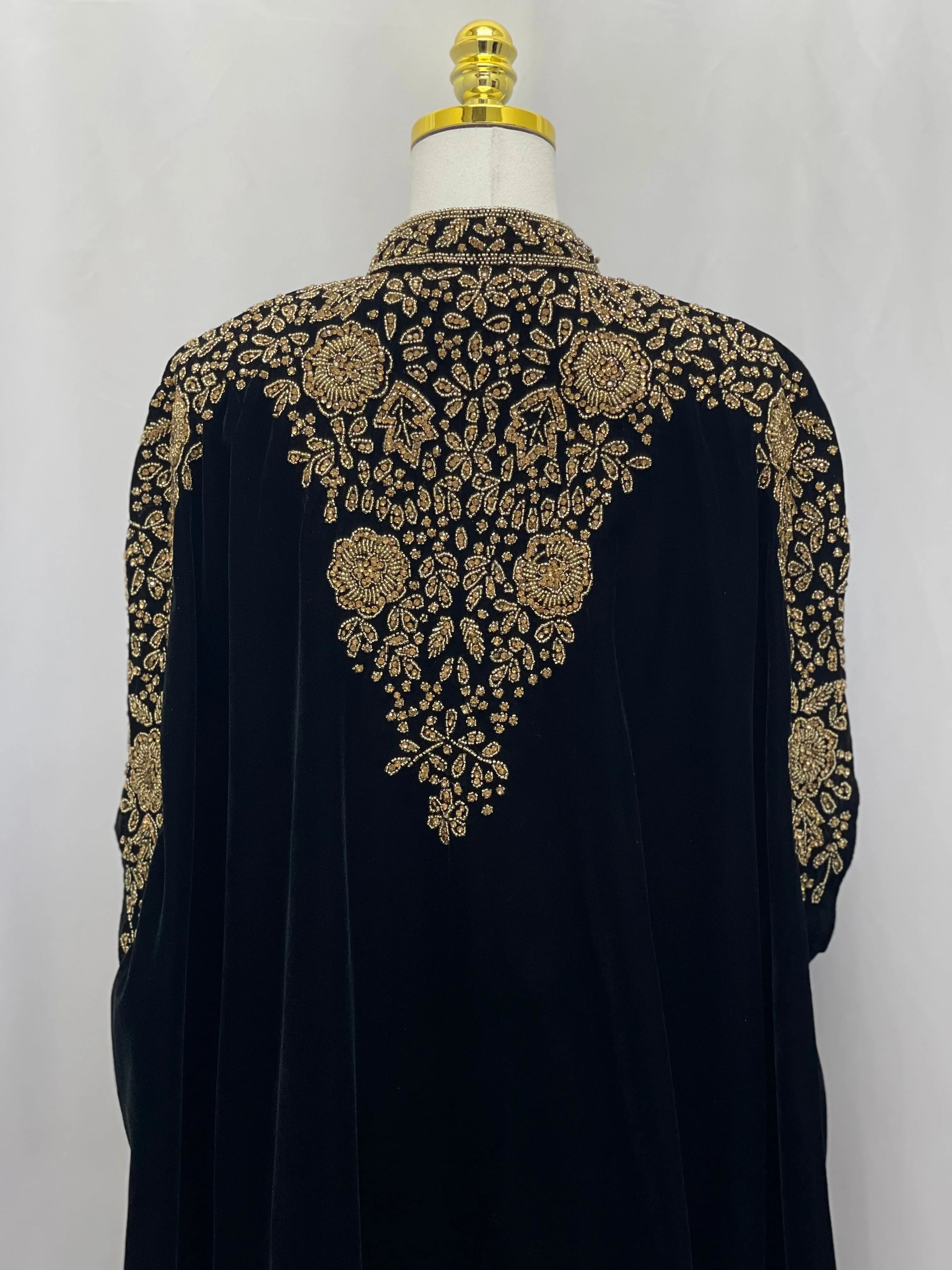 Palestinian Elegance Velvet Embellished Cape black cardigan with intricate gold floral embroidery on back and sleeves
