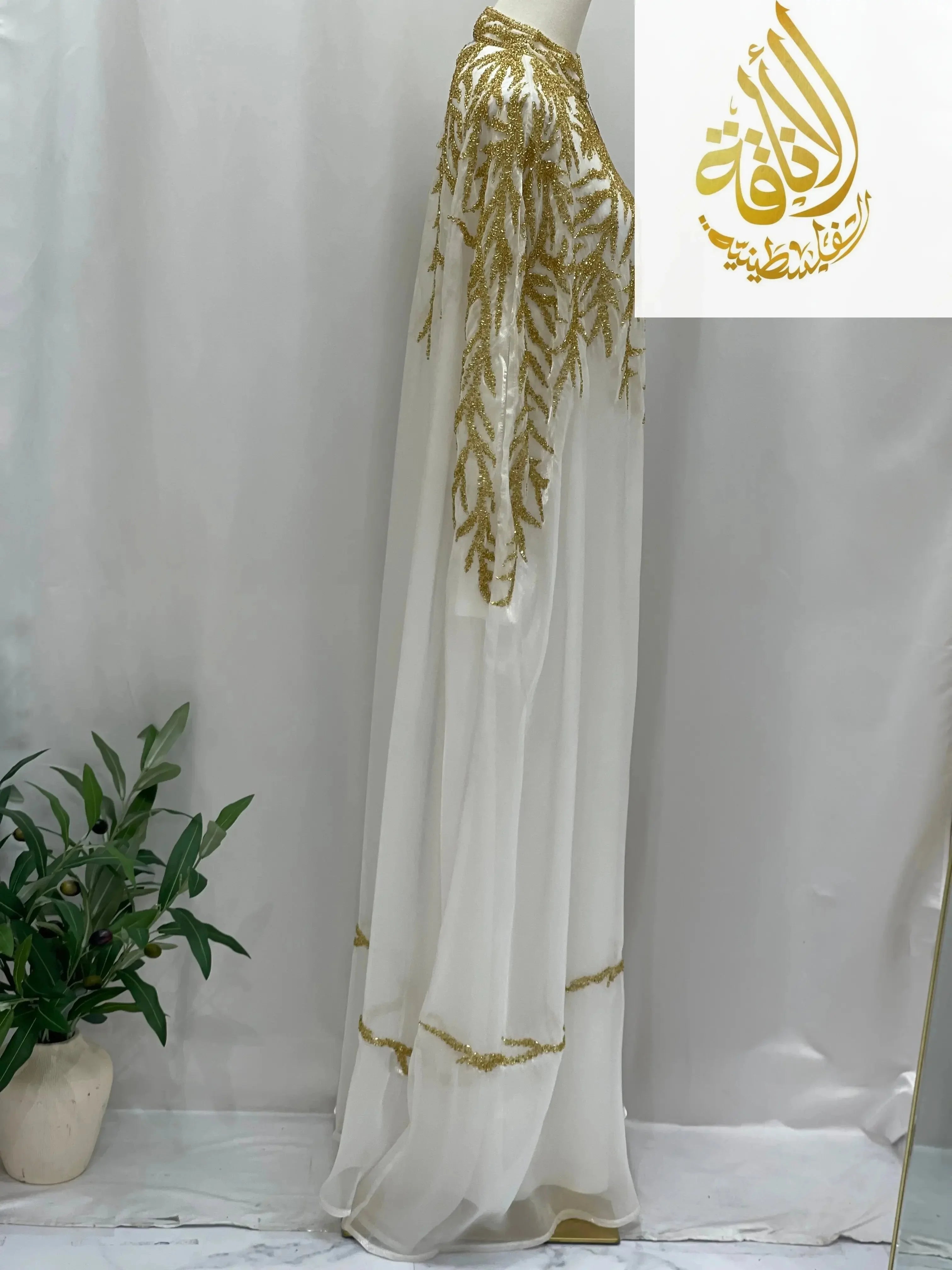 Palestinian Elegance Luxury Majestic Embellished Cape white cardigan with gold sequin details