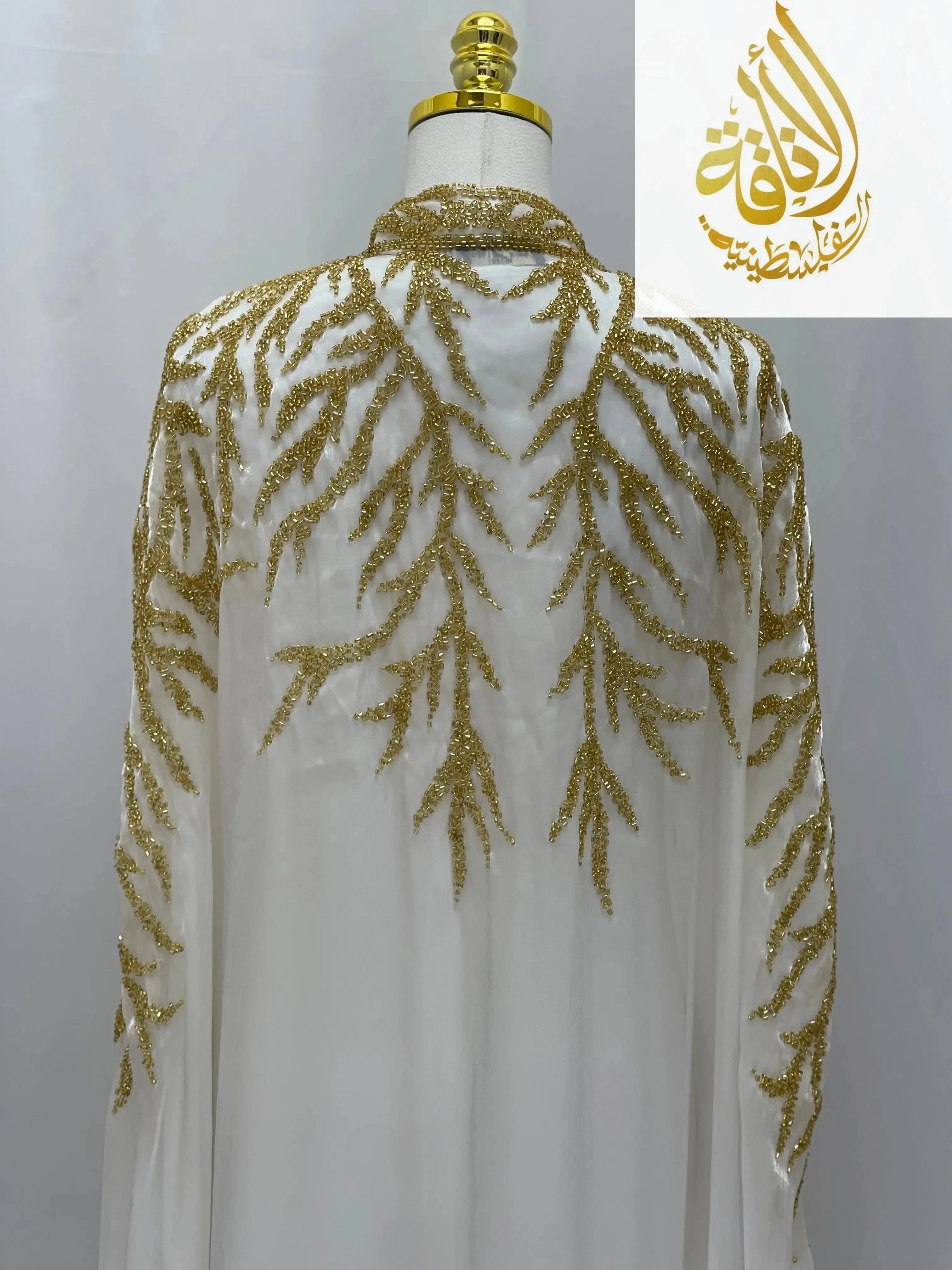 Luxury Majestic Embellished Cape white cardigan with gold intricate beadwork by Palestinian Elegance