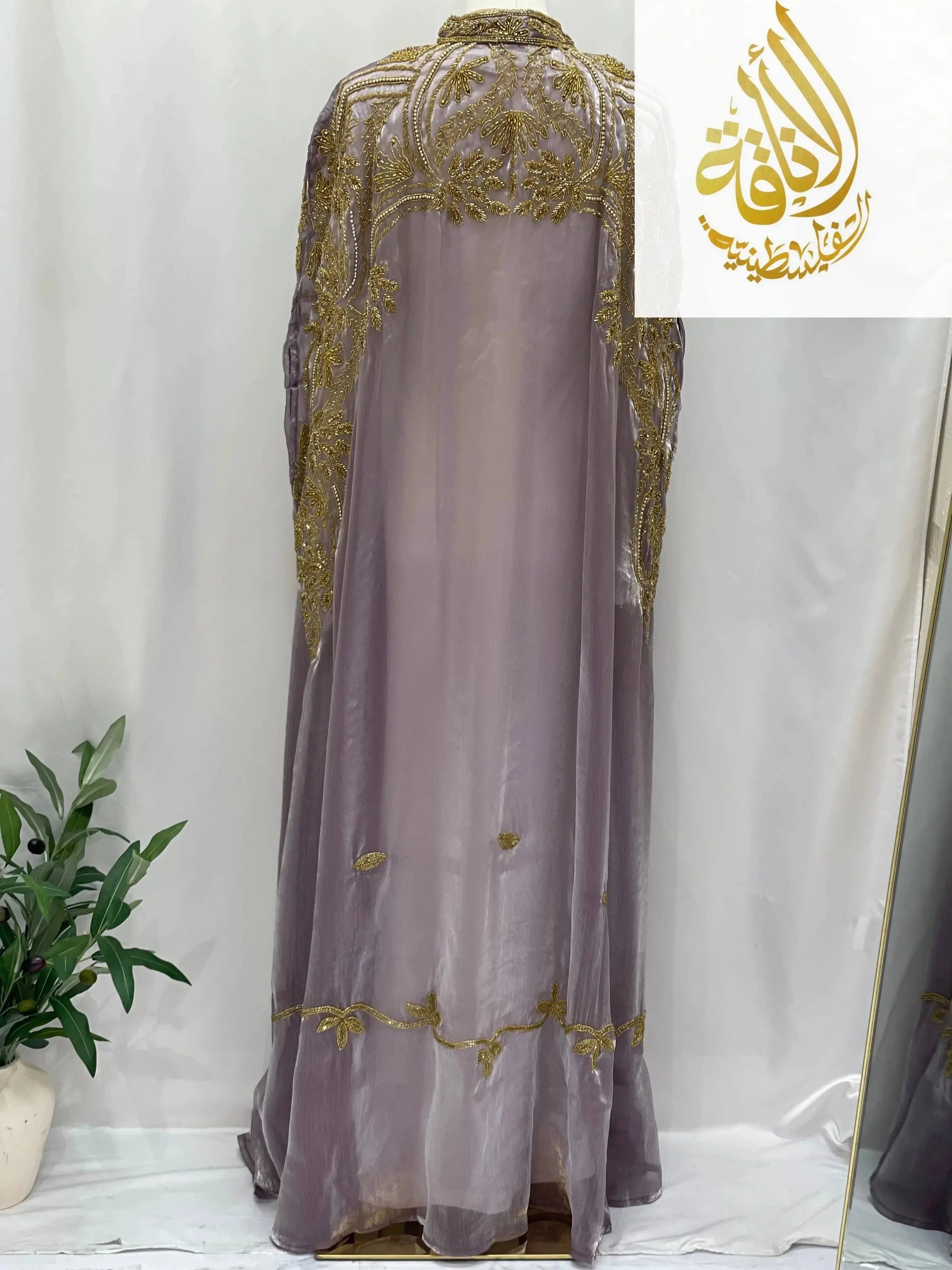 Palestinian Elegance Regal Frosted Lavender Cape with intricate gold embroidery and sheer fabric