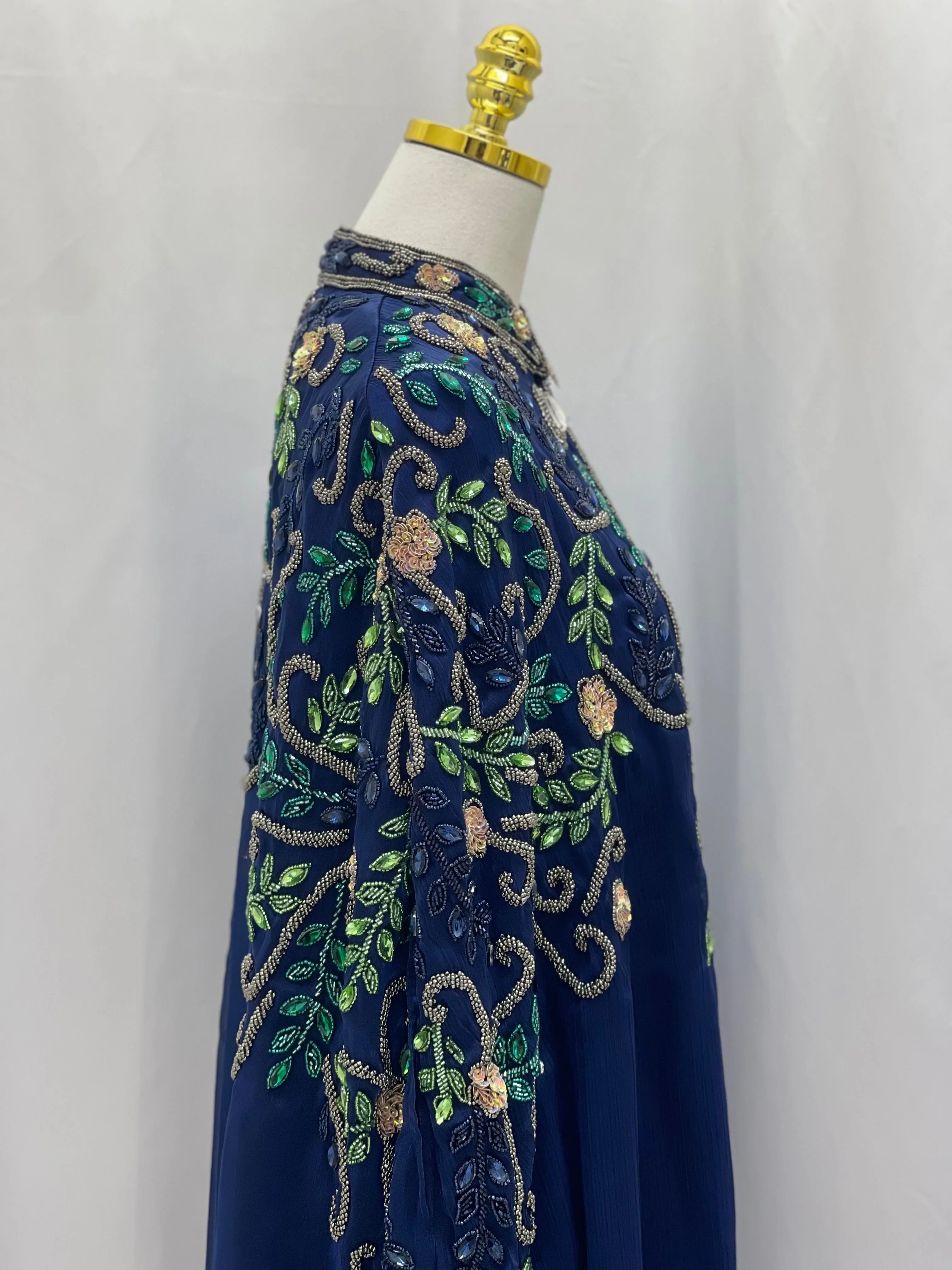 Palestinian Elegance Royal Blue Bejeweled Cape cardigan with intricate green and gold embroidery details