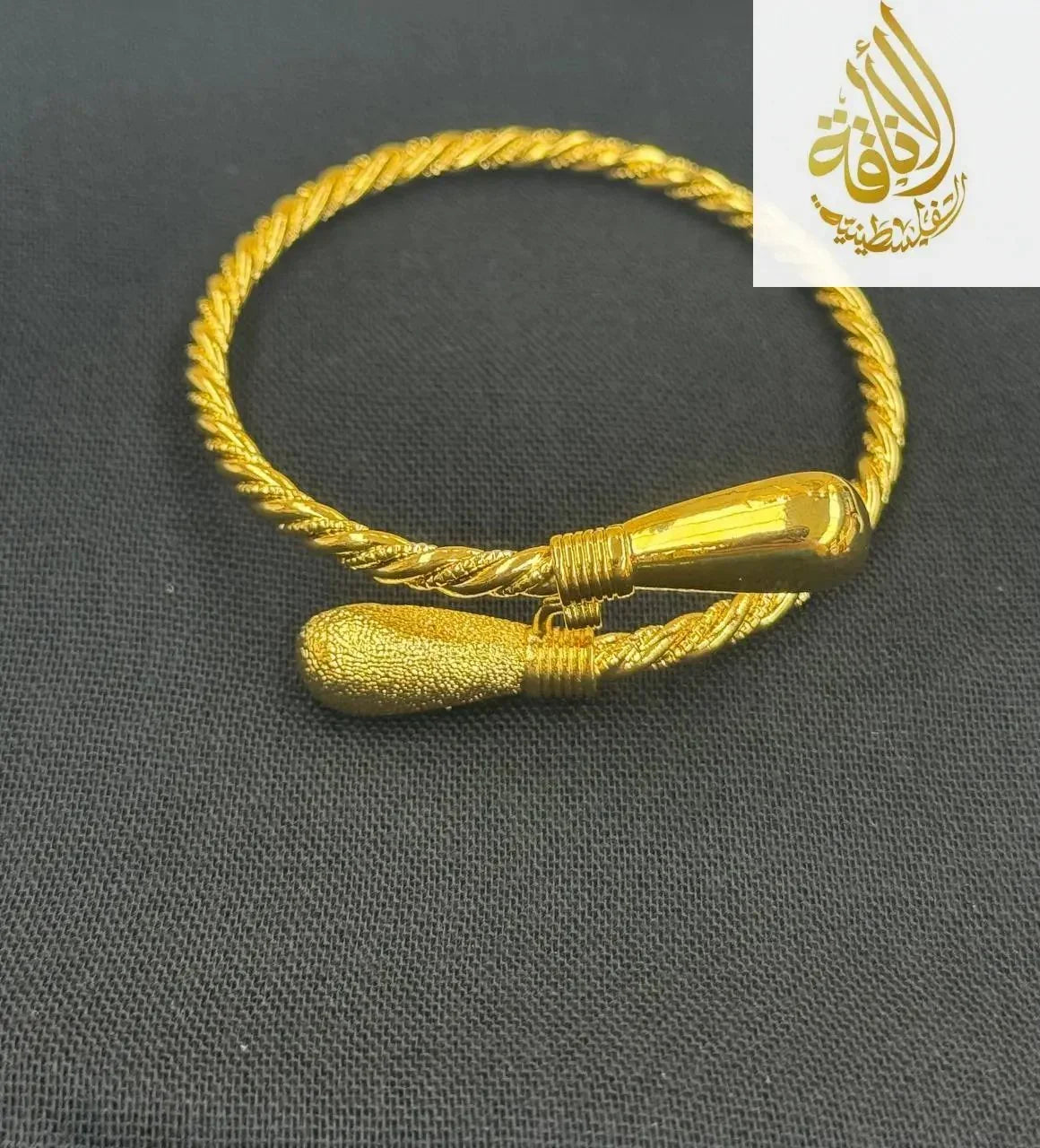 Palestinian Elegance imitated gold Mabroume Single Injasa Bracelet with twisted band design