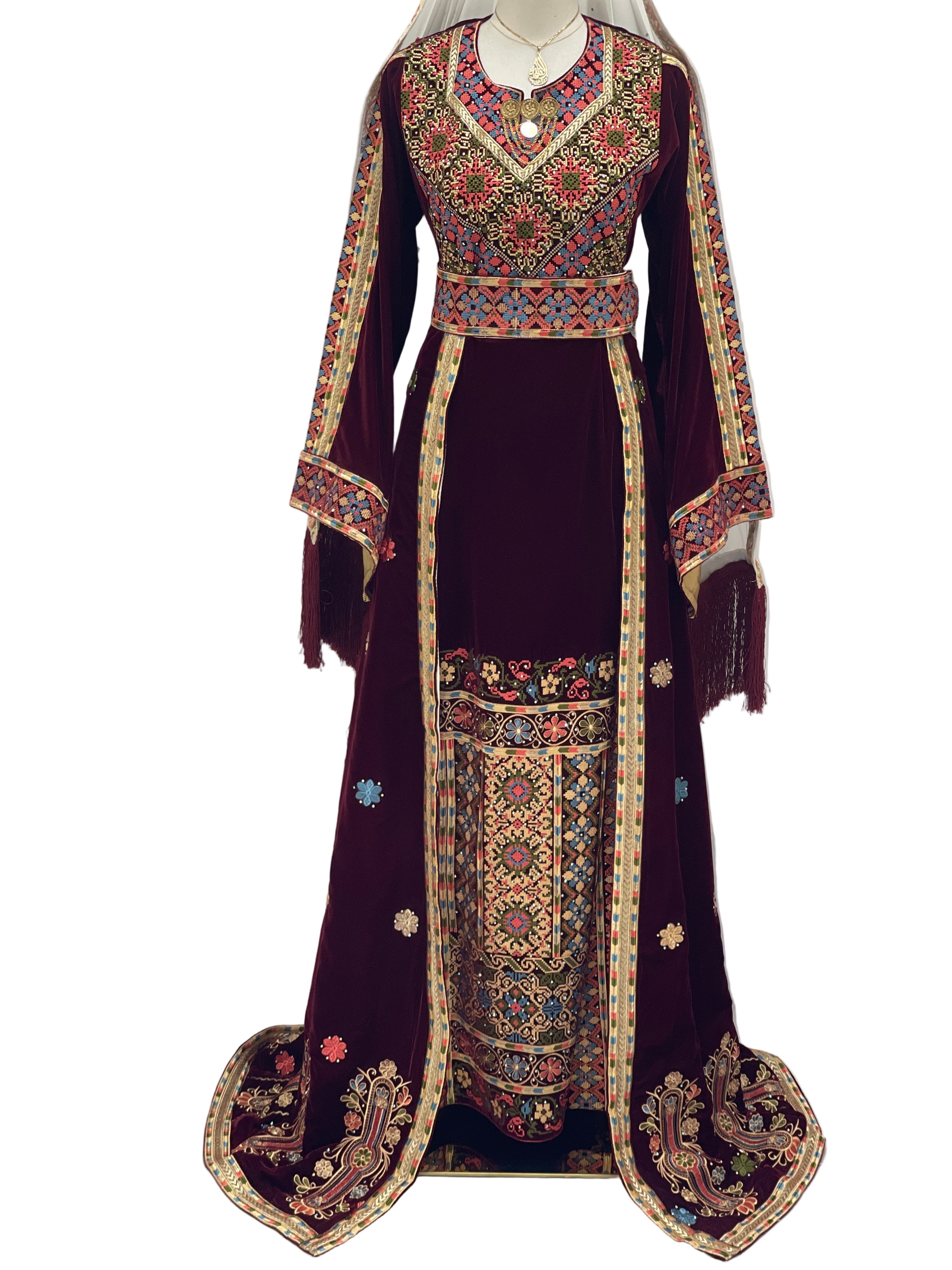 Maise Velevt Embroidered Thoub in deep burgundy with traditional Palestinian patterns and elegant fringe details