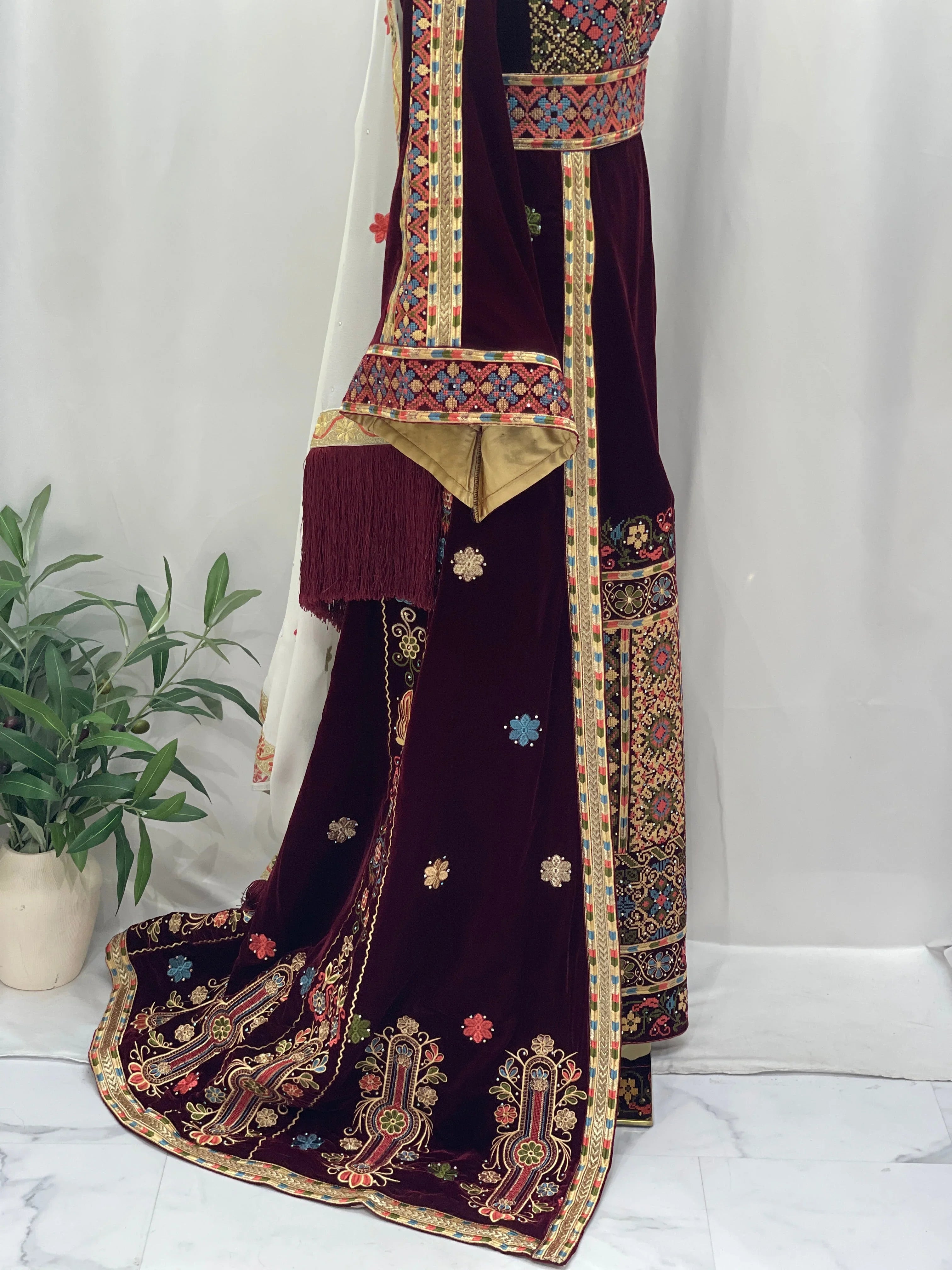 Maise Velvet Embroidered Thoub in deep burgundy with intricate floral designs and elegant detailing