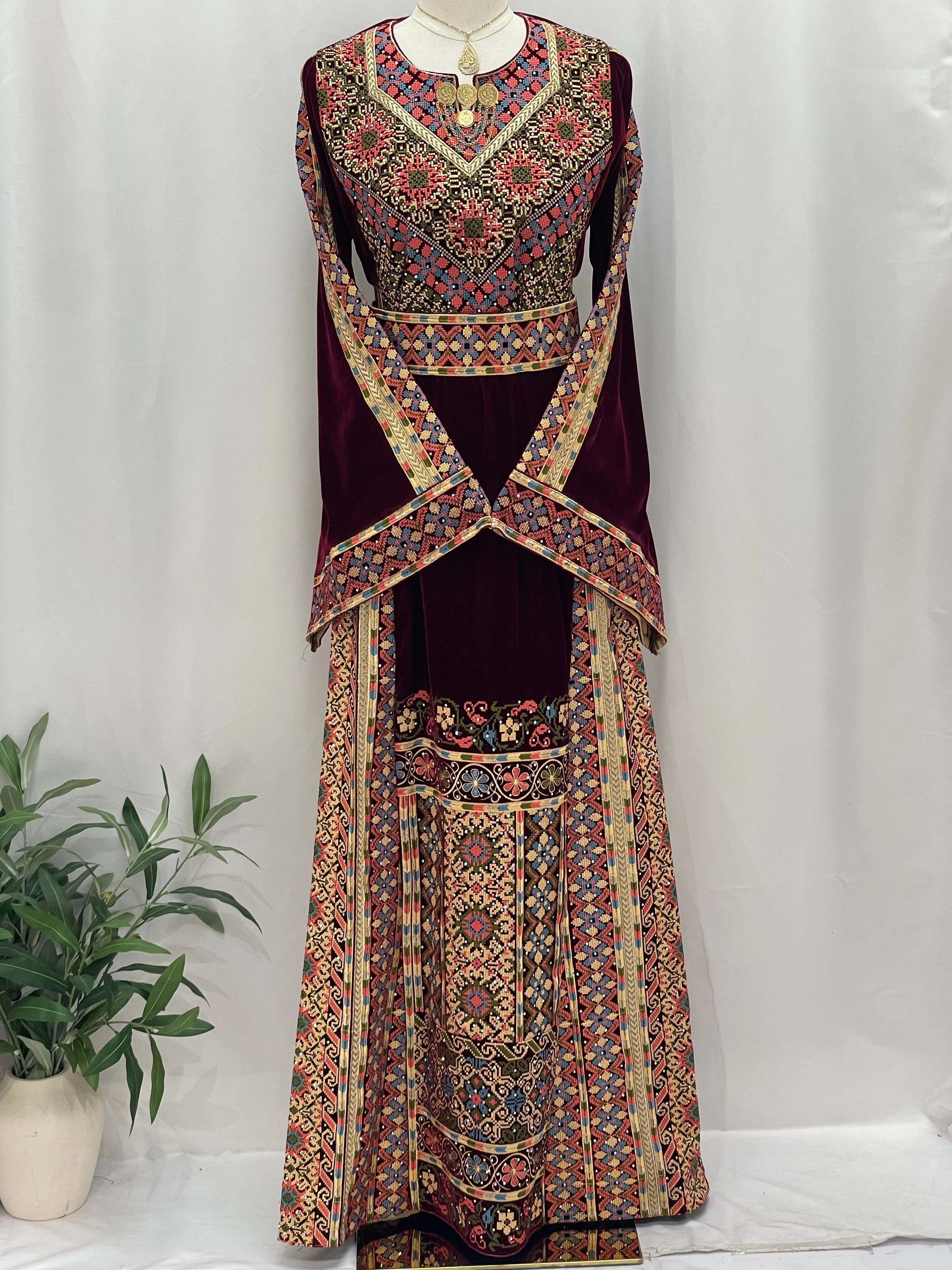 Maise Velevt Embroidered Thoub in rich colors with intricate floral designs and elegant sleeves