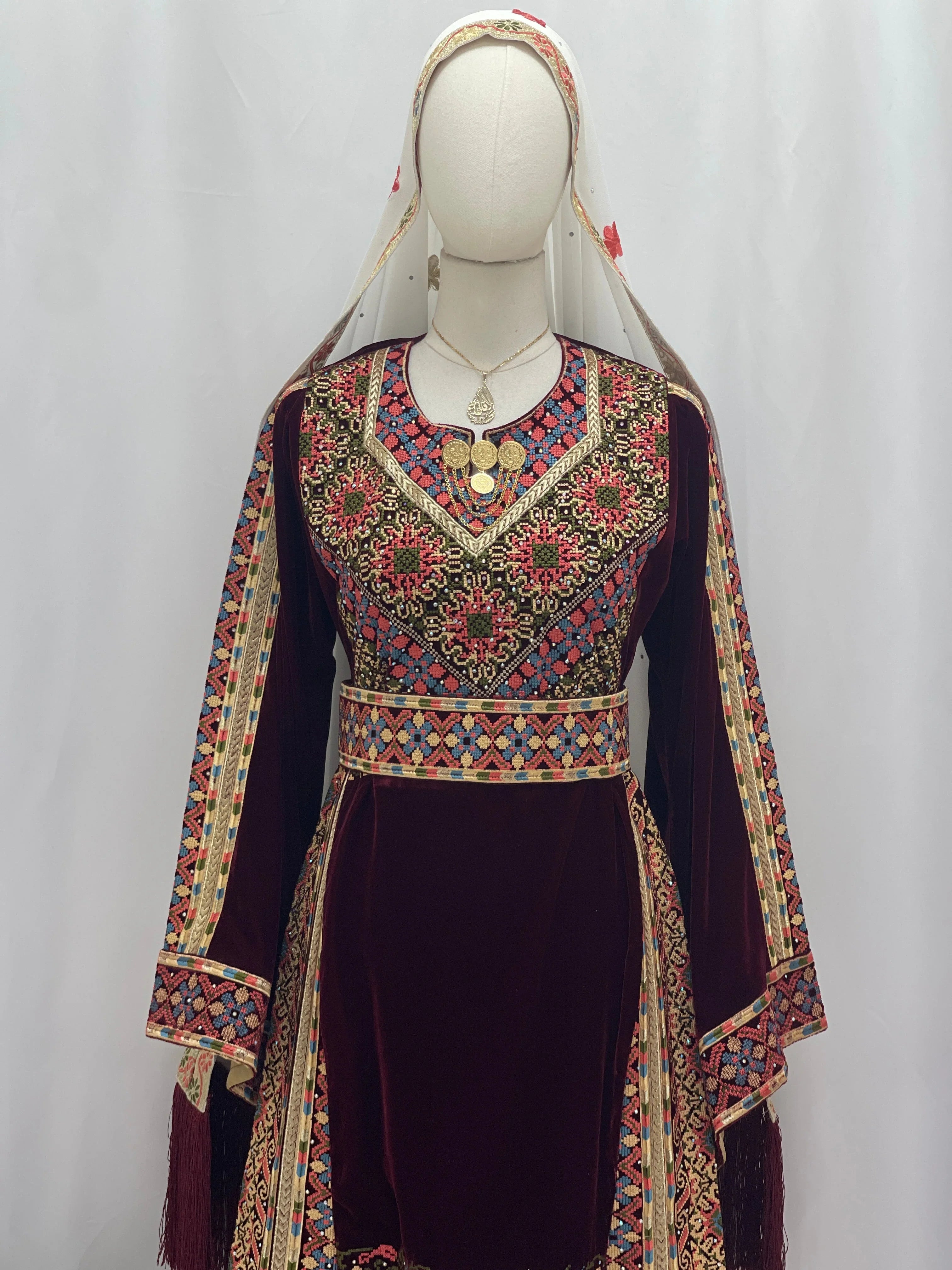 Elegant Maise Velvet Embroidered Thoub featuring vibrant floral designs and intricate details